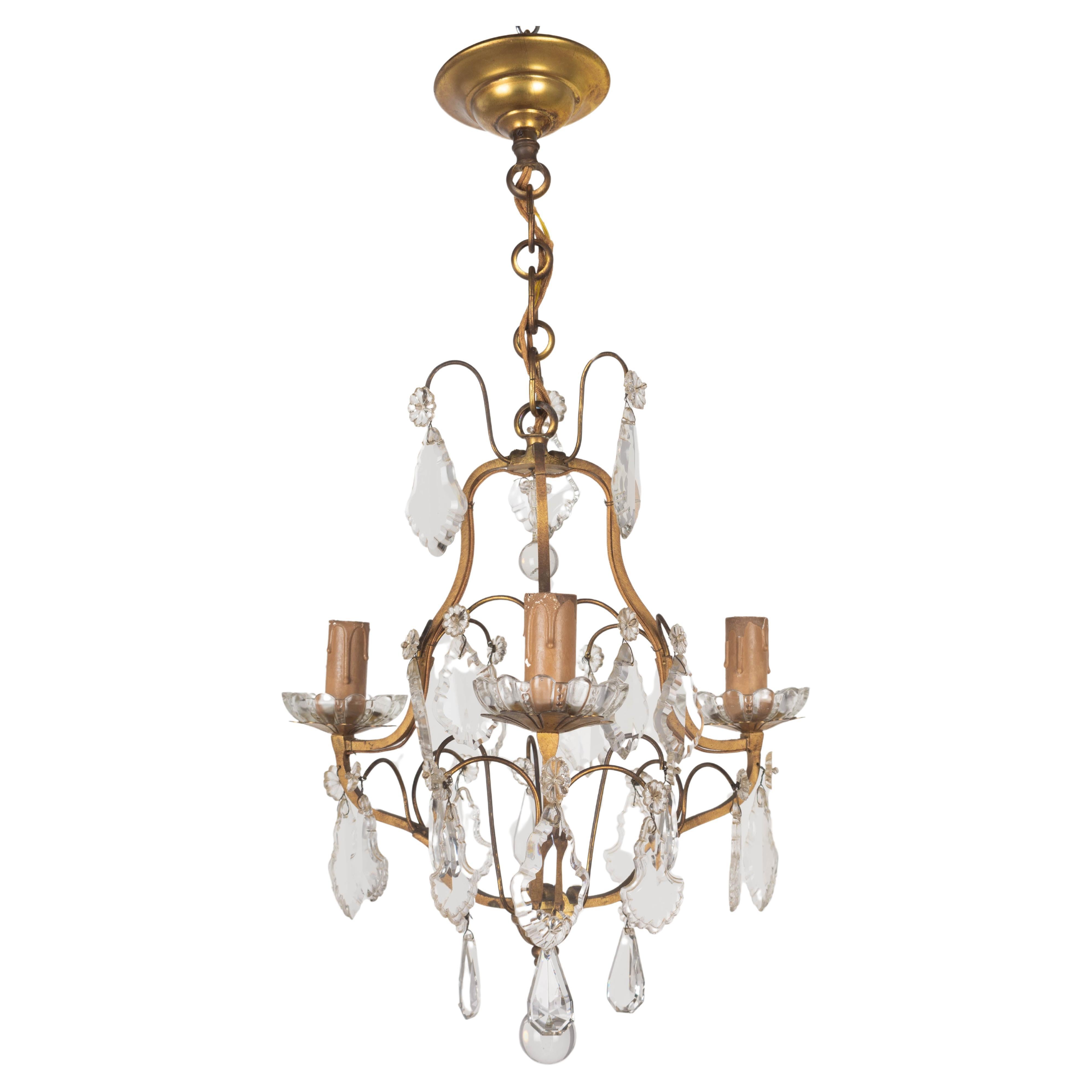 French Louis XV Style Brass & Crystal Chandelier For Sale