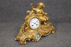 French Louis XV style Bronze Ormolu Mantle Clock with Sevres Style Plaques