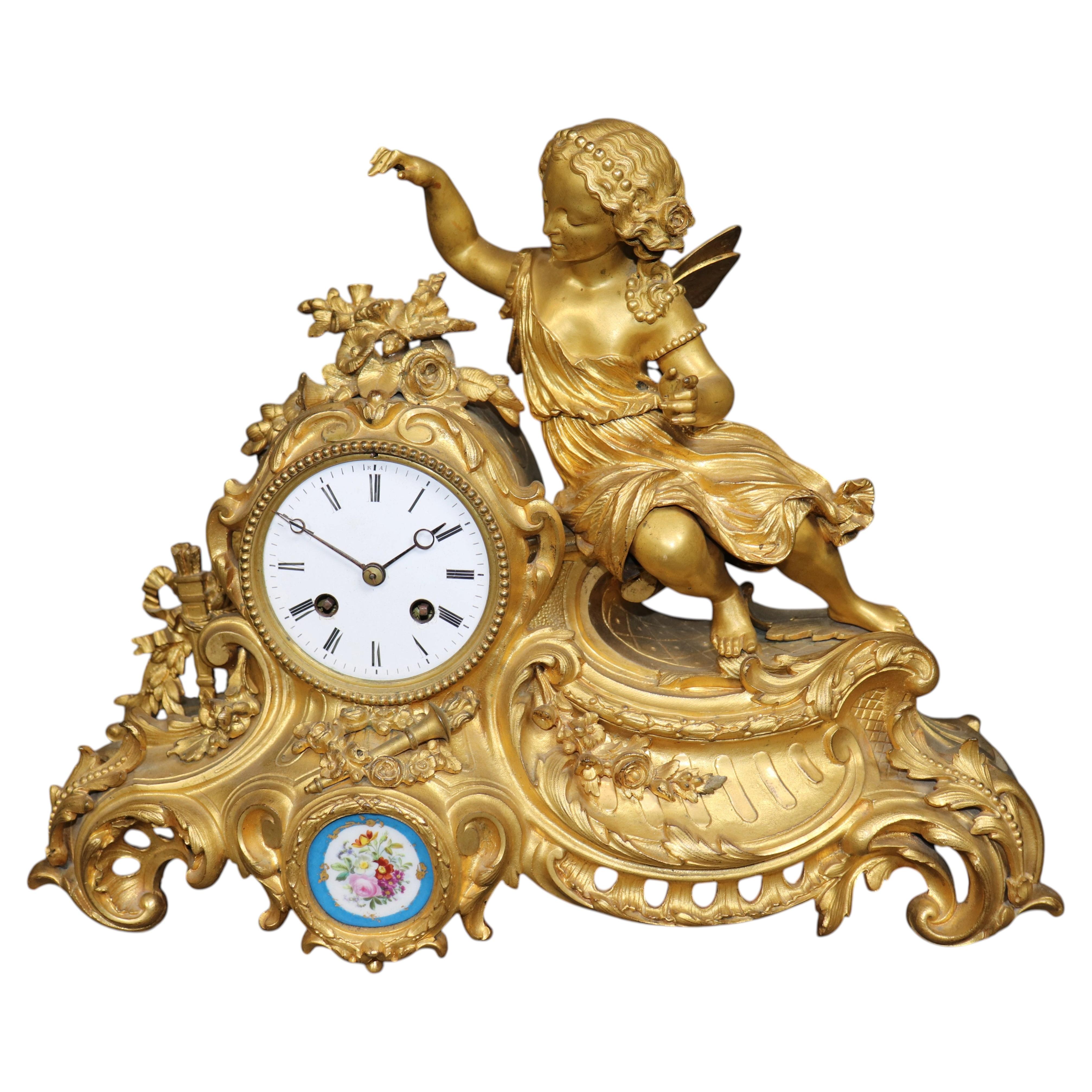 French Louis XV style Bronze Ormolu Mantle Clock with Sevres Style Plaques