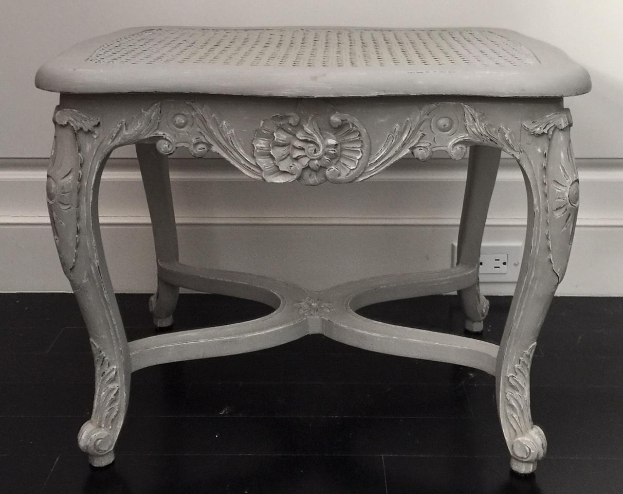 French Louis XV style caned grey patinated bench with Entretoise.
Lovely versatile model. Four benches in store. Price per one bench.
Shell detail, delicate carvings on entretoise legs. Caned top.