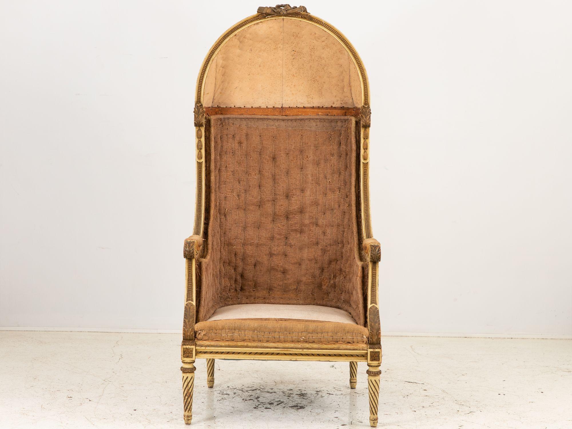 This exquisite 19th-century Louis XV style carved balloon porter's chair is a testament to the timeless elegance of French craftsmanship. Crafted in France during the second half of the 19th century, this chair showcases remnants of gilding that