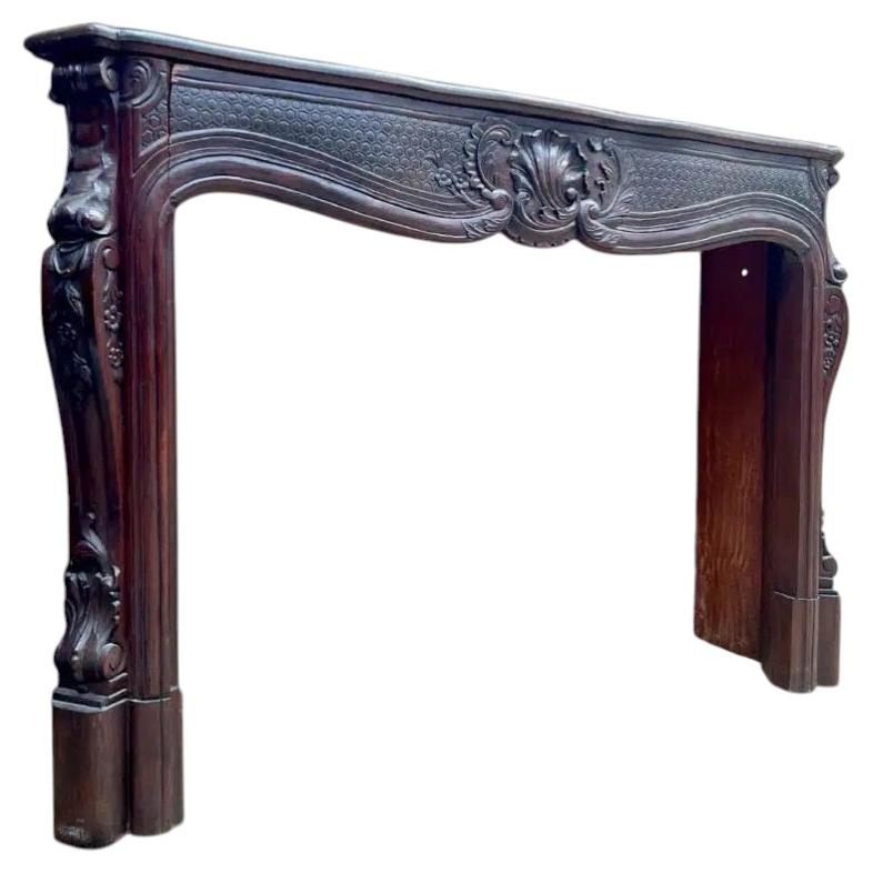 French Louis XV Style Carved Oak Fireplace Mantel, France, circa 1900 For Sale