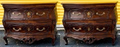 Paire de commodes/commodes serpentines en chêne sculpté de style Louis XV, France