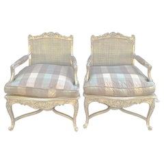Sedie bergere a canne intagliate e dipinte in stile Louis Cane XV - Coppia