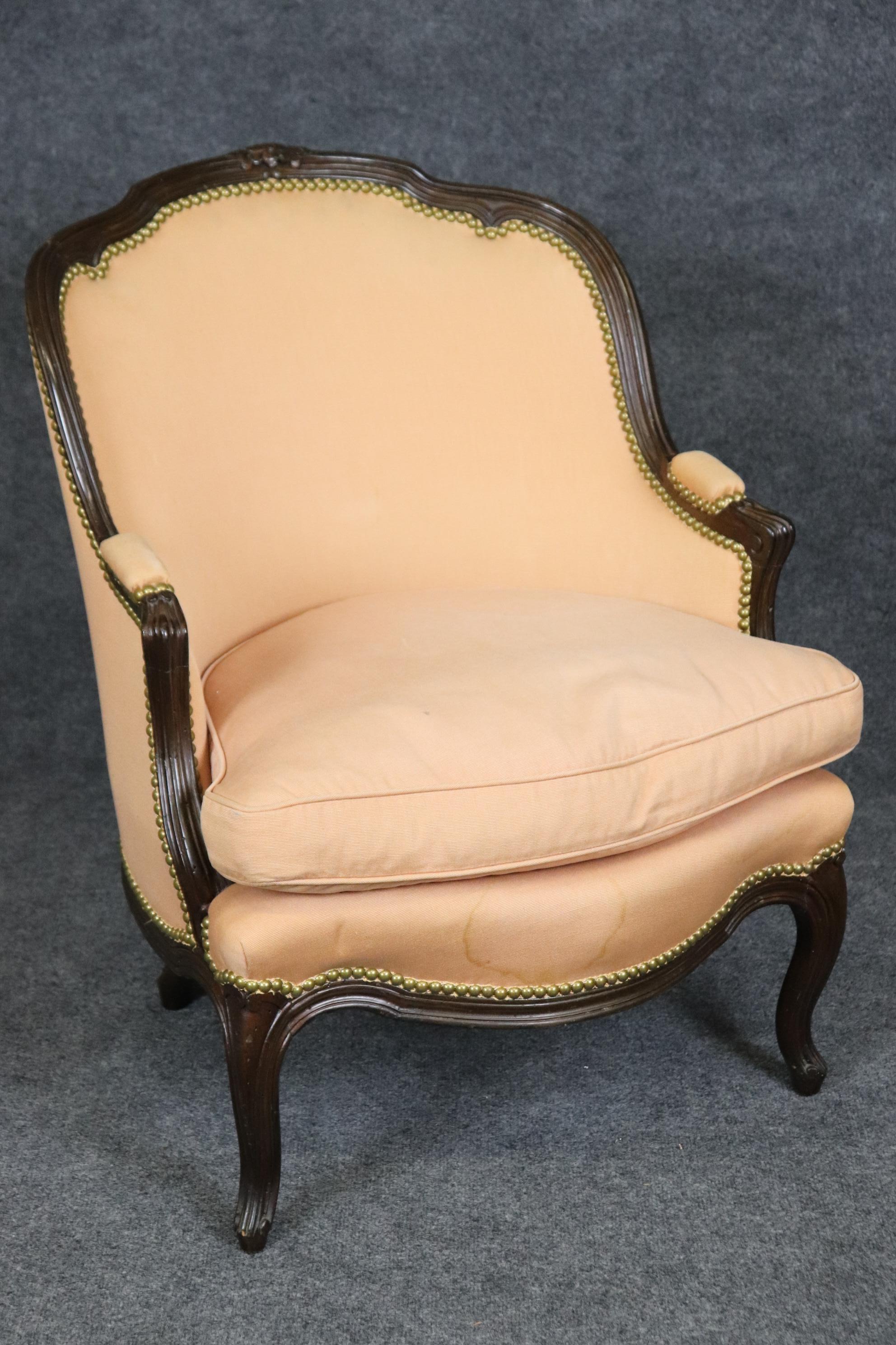 Dimensions: Height: 32 1/2in Width: 25 1/2in Depth: 25in Seat Height: 18in 

This vintage Louis XV style upholstered bergere chair is made of the highest quality and is perfect for you and your home! If you look at the photos provided, you will see