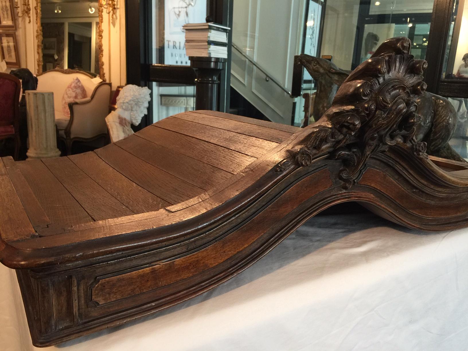 French Louis XV style 19th century Chapeau de gendarme bed canopy, was formerly the top of a Provencal armoire.

This beautifully carved piece has been repurposed as a bed canopy. With a canopy drape (not included) attached to the Ciel de Lit and