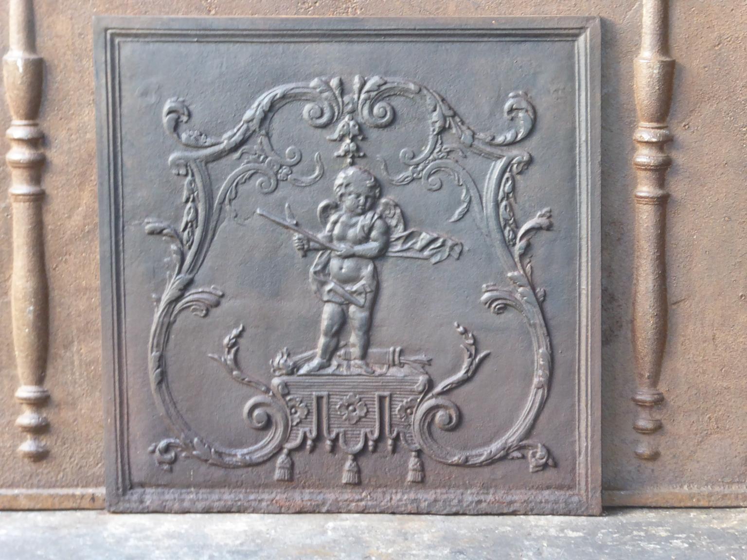 French Louis XV style fireback with a cupid. The fireback is made of cast iron and has a natural brown patina. Upon request it can be made black. The fireback is in a good condition and does not have cracks.







 