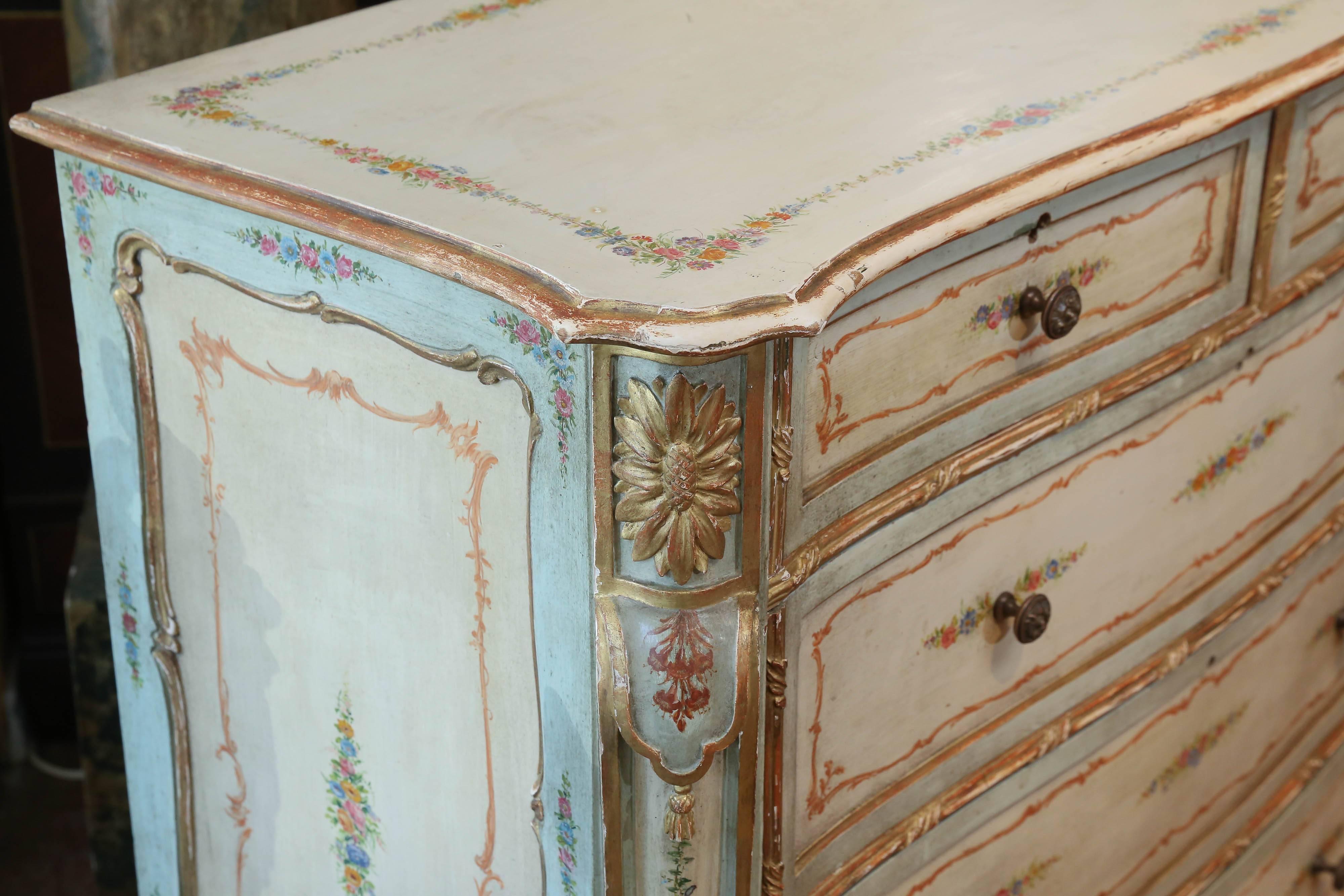 Lovely antique floral painted chest having two upper drawers over three
Lower drawers. Very softly painted in a aqua shade on the body and
Having gilt painted edges with a gilt floral burst on the upper corners.
Beautifully painted floral motif