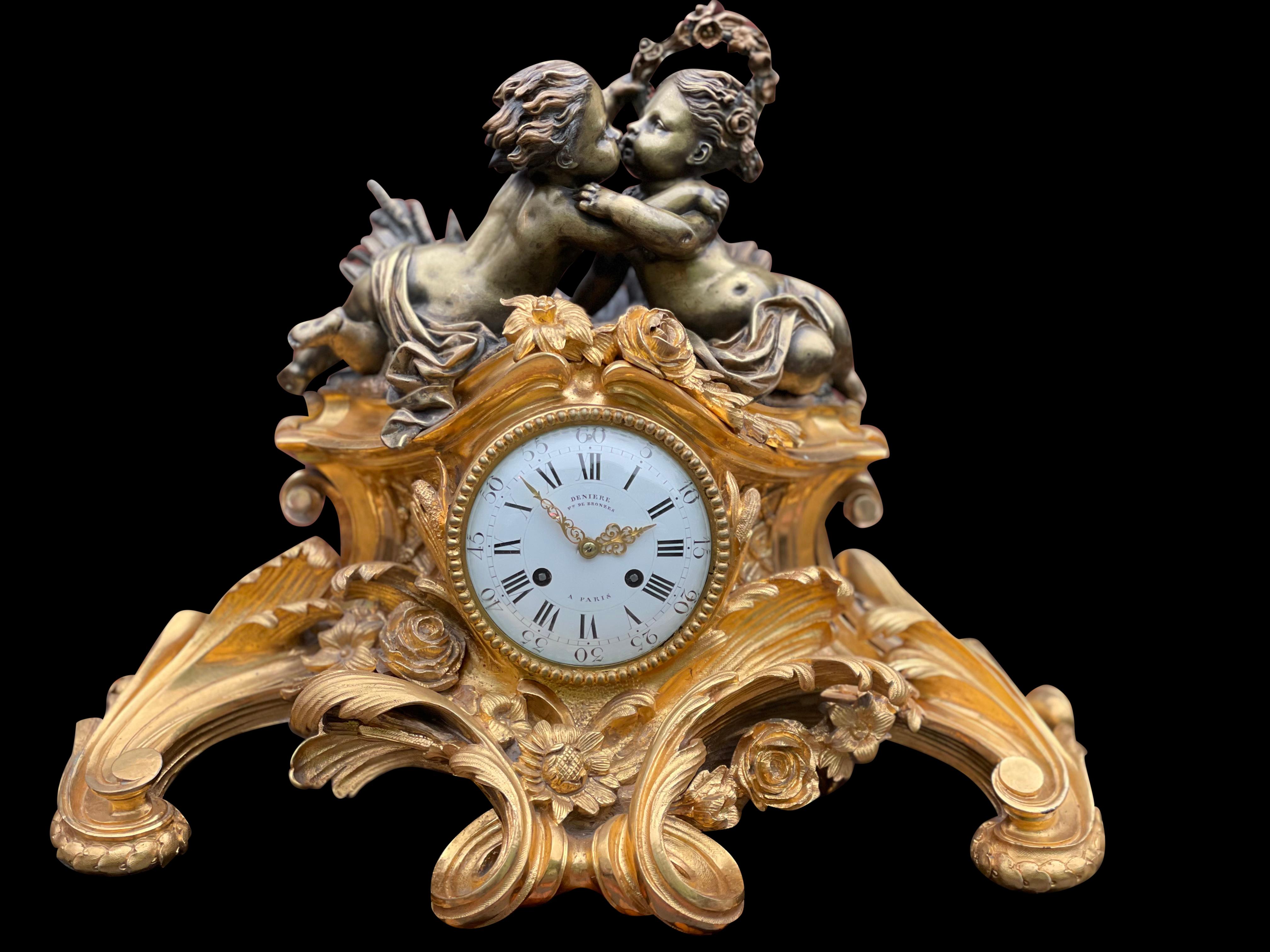 A stunning French Louis XV style gilt bronze mantle clock, 19th century. Perfect for home decoration.