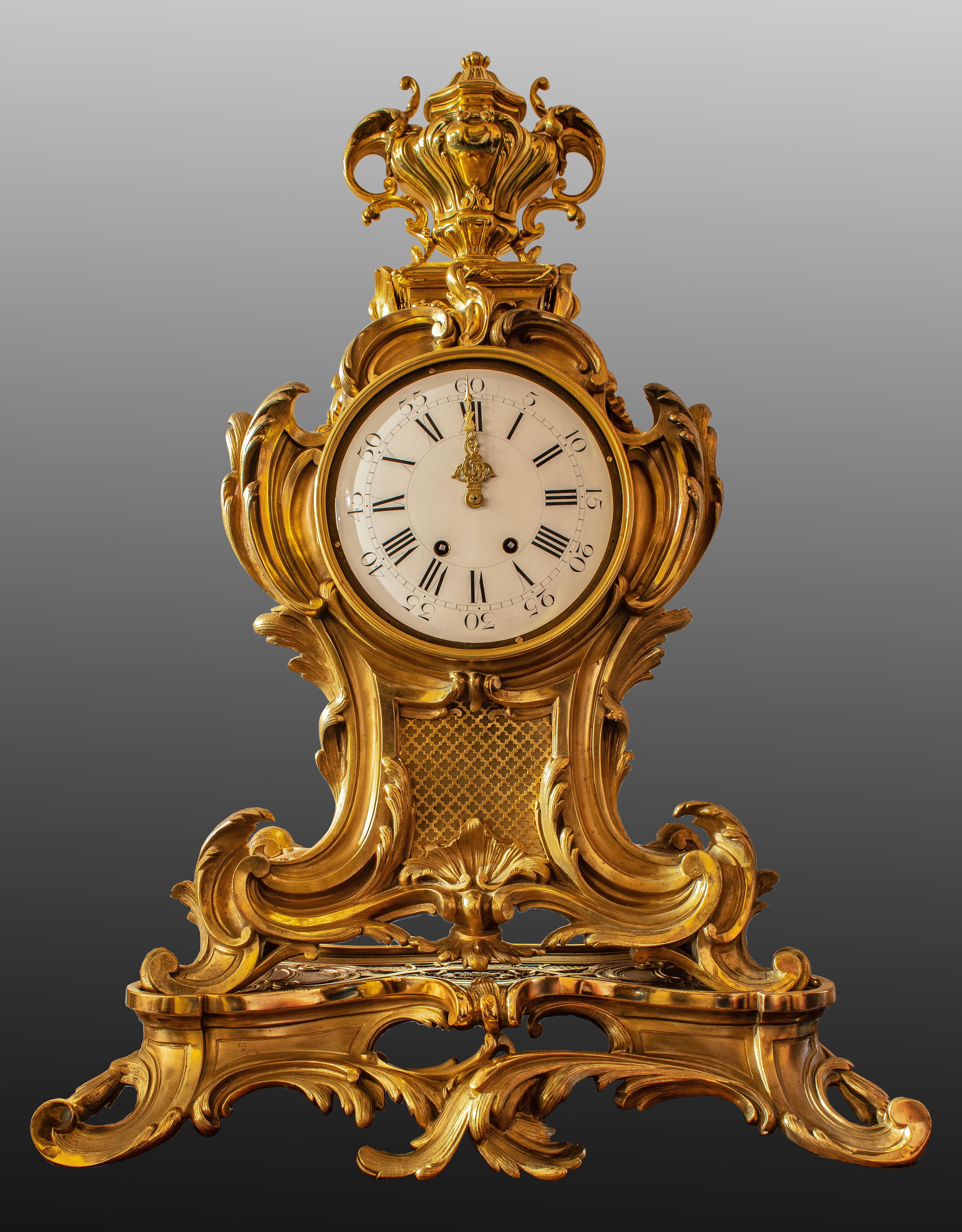A very large 19th century French gilt bronze Louis XV style clock on stand.