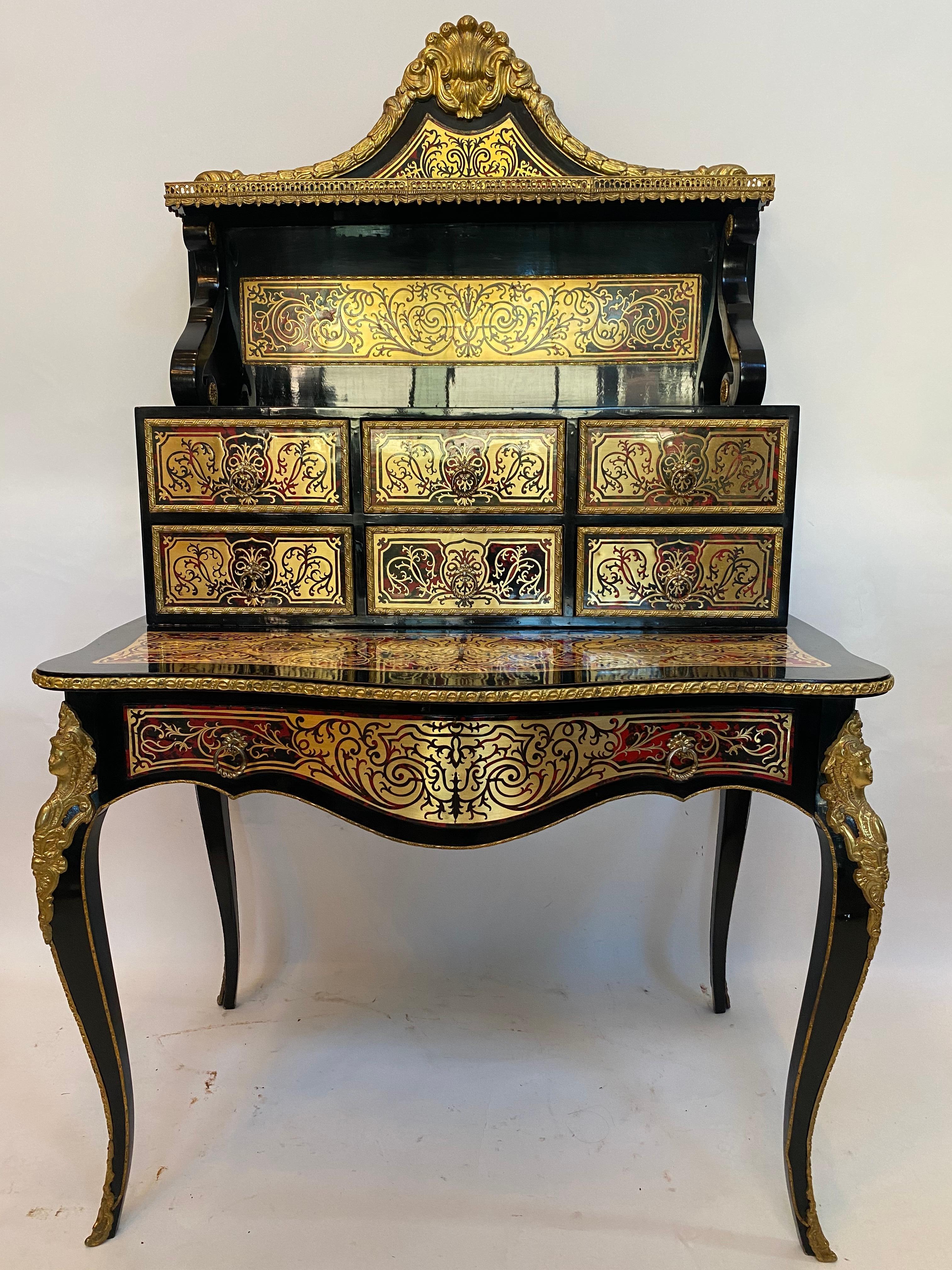 This Louis XV style vanity gilt bronze-mounted desk has one wide drawer in front and there are 6 drawers on two lines for even more storage. Fine writing desk with curved sides and gracefully carved legs bronze mounts. See more pictures, measures: