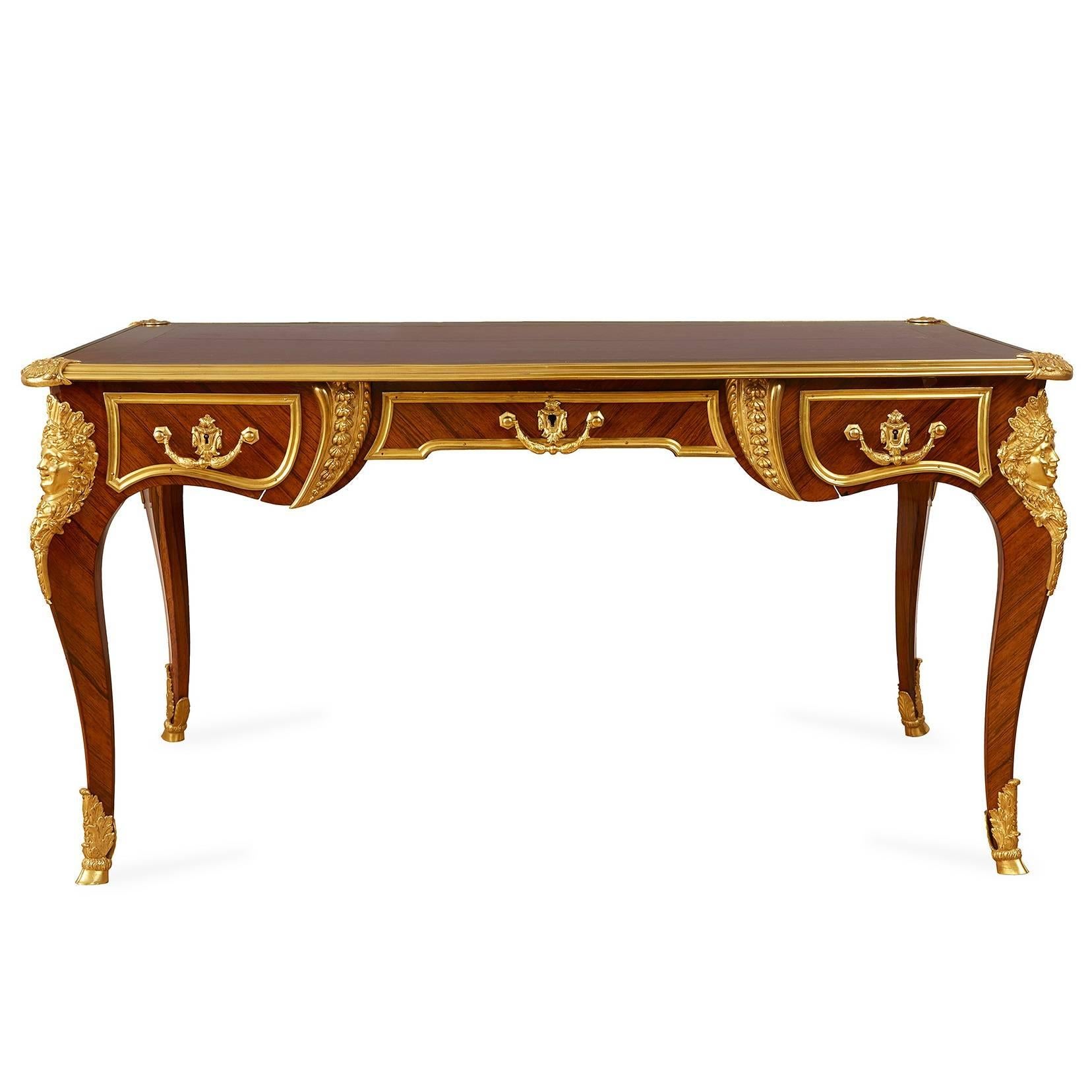 This beautiful desk, beautifully finished in kingwood, leather and gilt bronze, is a fantastic piece of 19th century French design in the Louis XV style. Elegant, beautifully crafted and yet with a cool simplicity, this will make an excellent piece