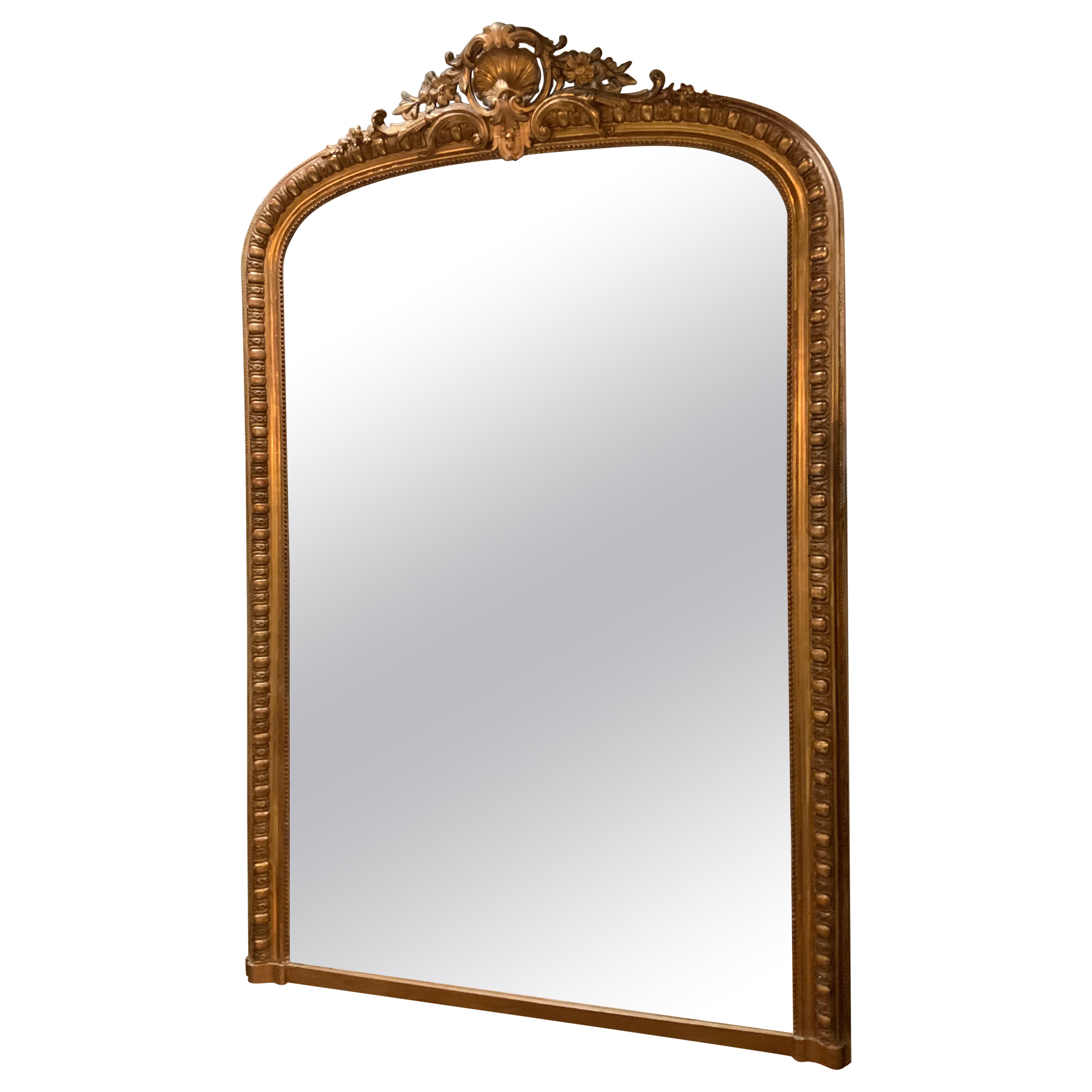 French Louis XV Style gilt mirror with foliate crest, 20 th c.