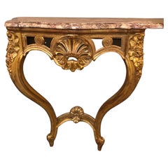 French Louis XV style gilt wall mounted console