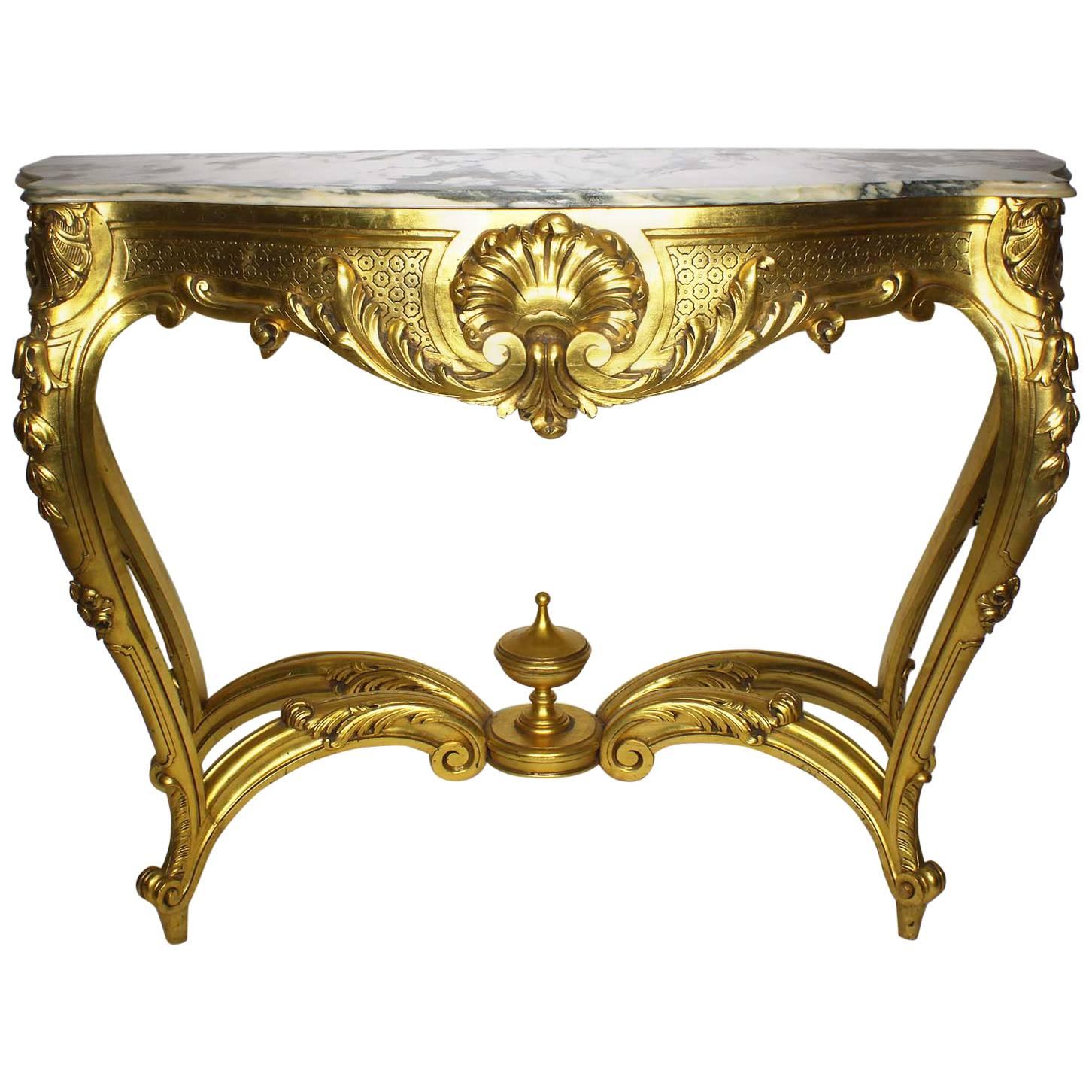 Tavolo consolle francese in stile Luigi XV in legno dorato intagliato con piano in marmo