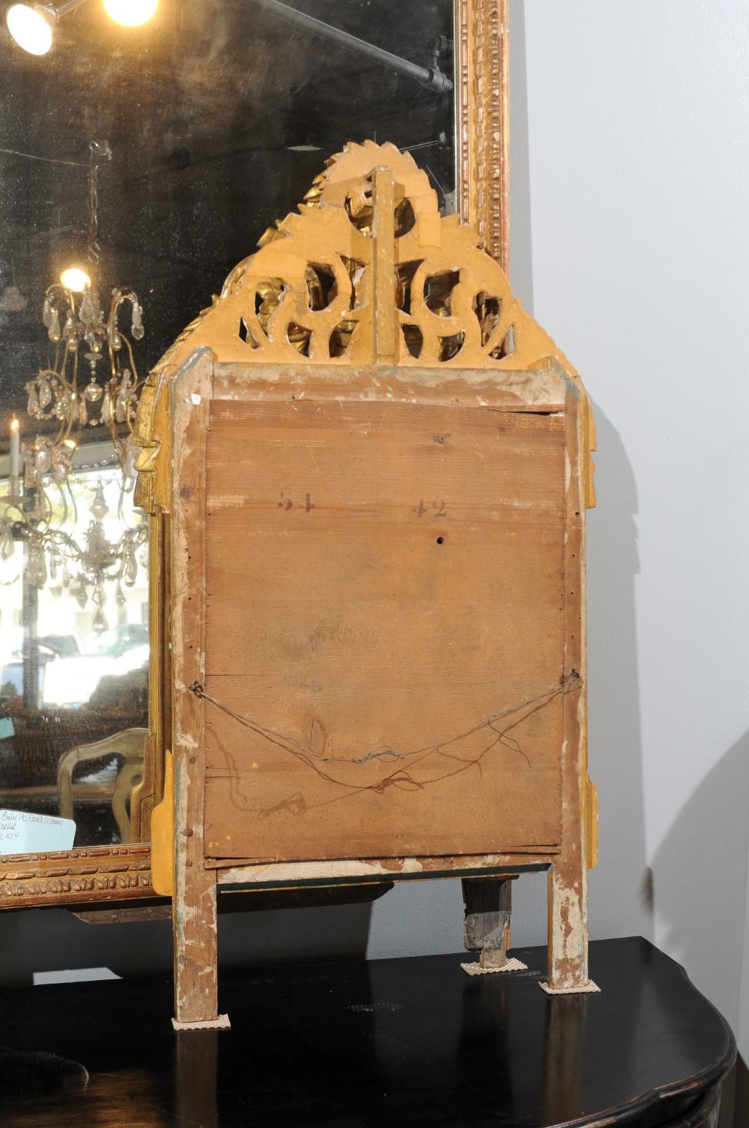 French Louis XV Style Giltwood Mirror with Hand Carved Liberal Arts Symbols In Good Condition For Sale In Atlanta, GA