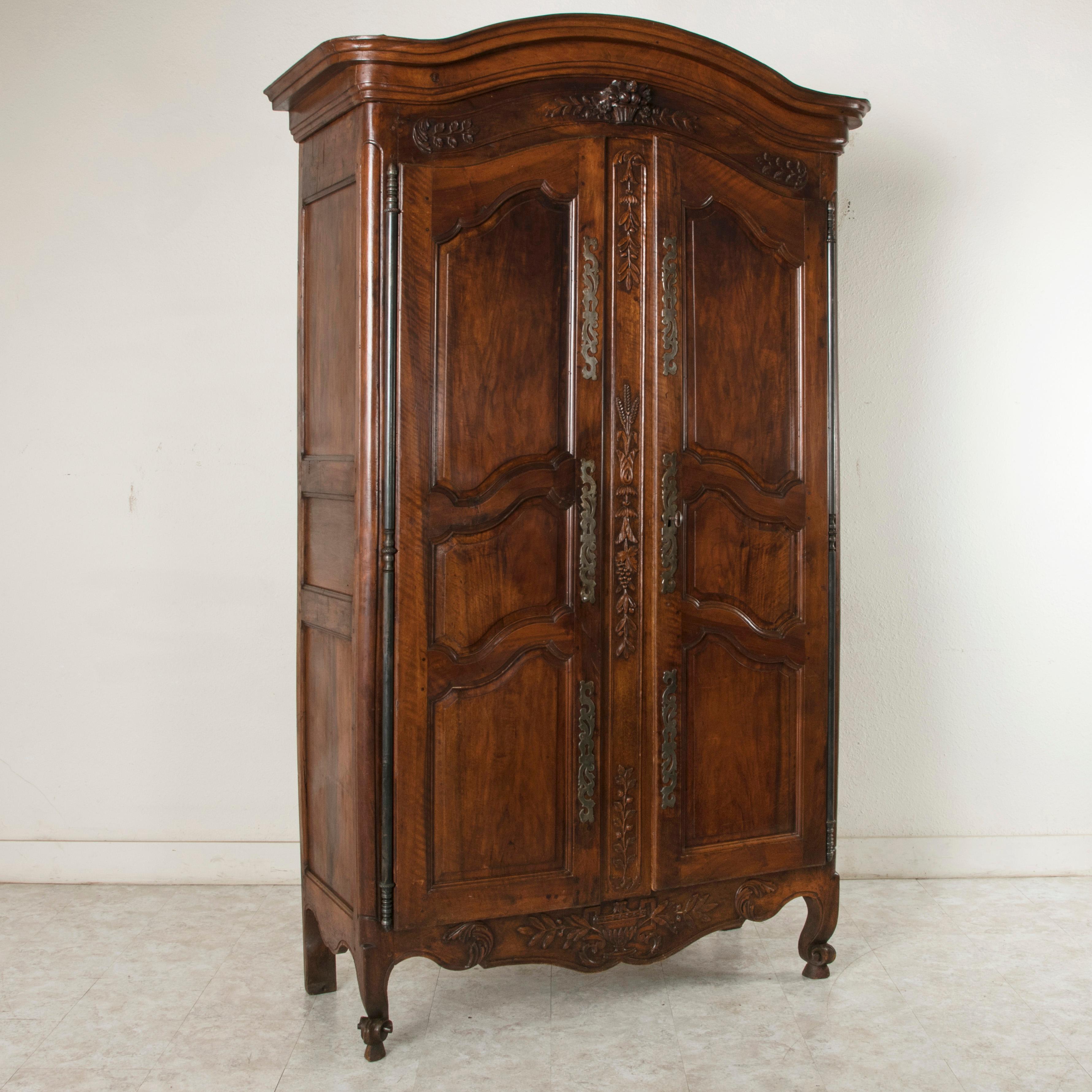French Louis XV Style Hand Carved Walnut Armoire with Iron Hardware