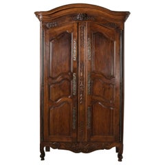 French Louis XV Style Hand Carved Walnut Armoire with Iron Hardware, circa 1800
