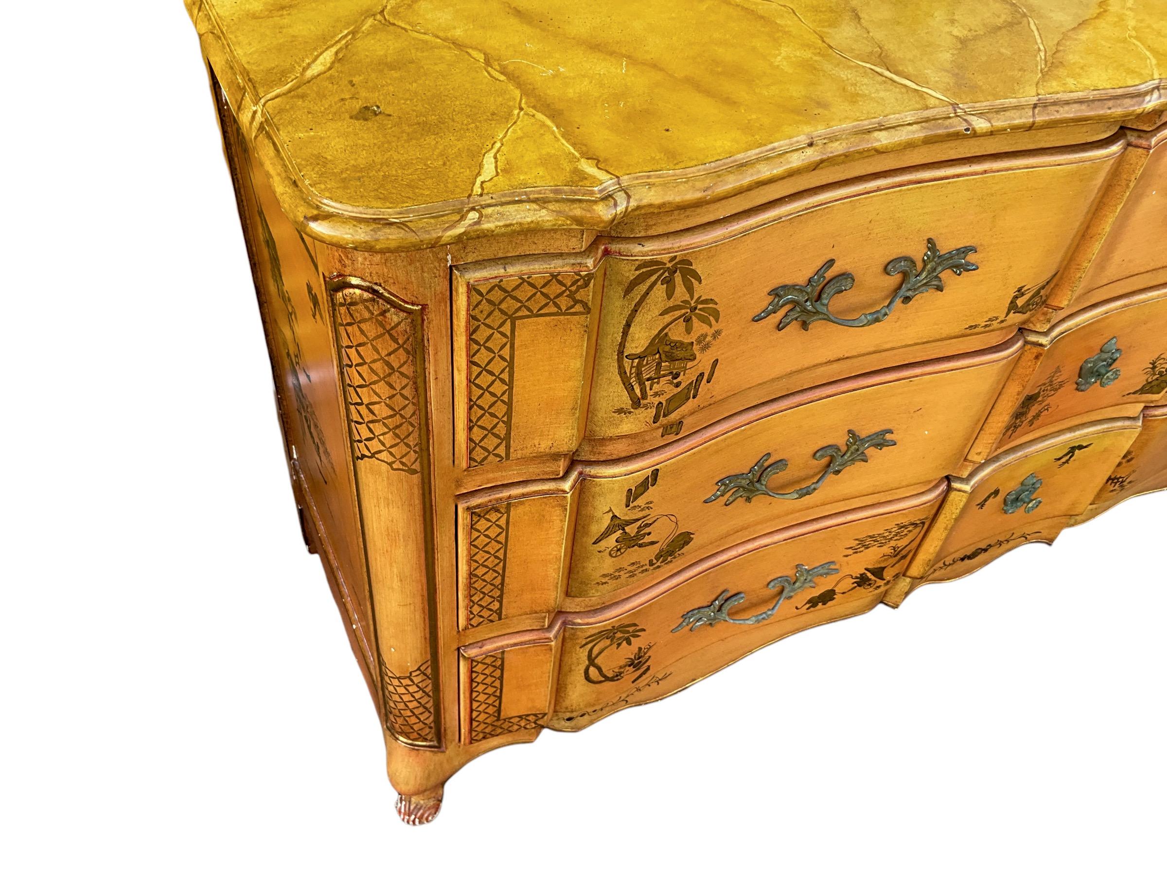 This is a French style Louis XV style chest with hand painted chinoiserie and faux marble top. I love this color! It unmarked and in very good condition with some choppiness to the paint. It is unmarked, and I believe it to be an American piece. It