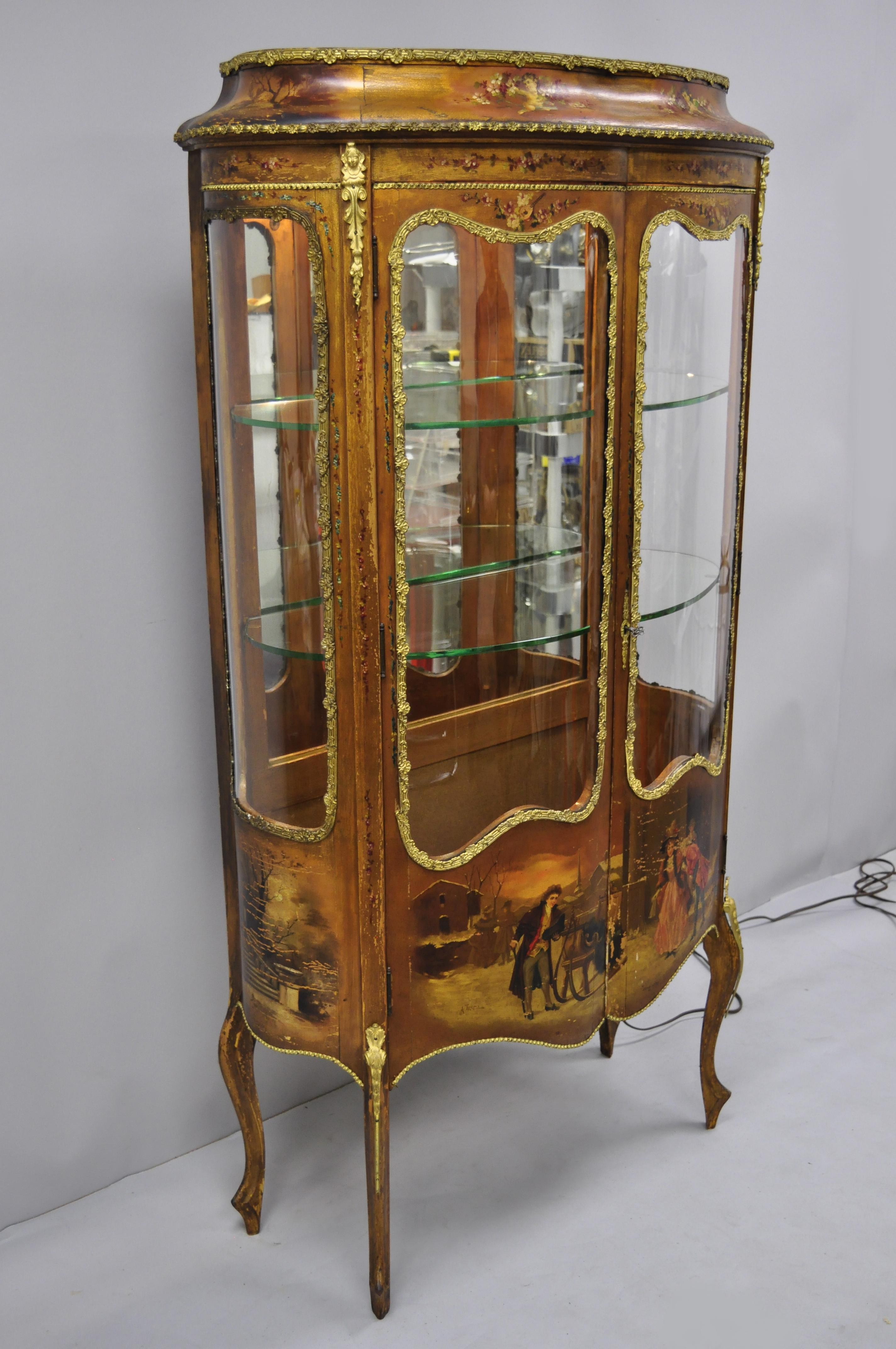 Antique French Louis XV style hand painted Vernis Martin Vitrine China cabinet. Item features 4 curved glass panels, bronze & brass ormolu, hand painted scenes and floral detail, mirror back, distressed finish, lighted interior, 2 swing doors,