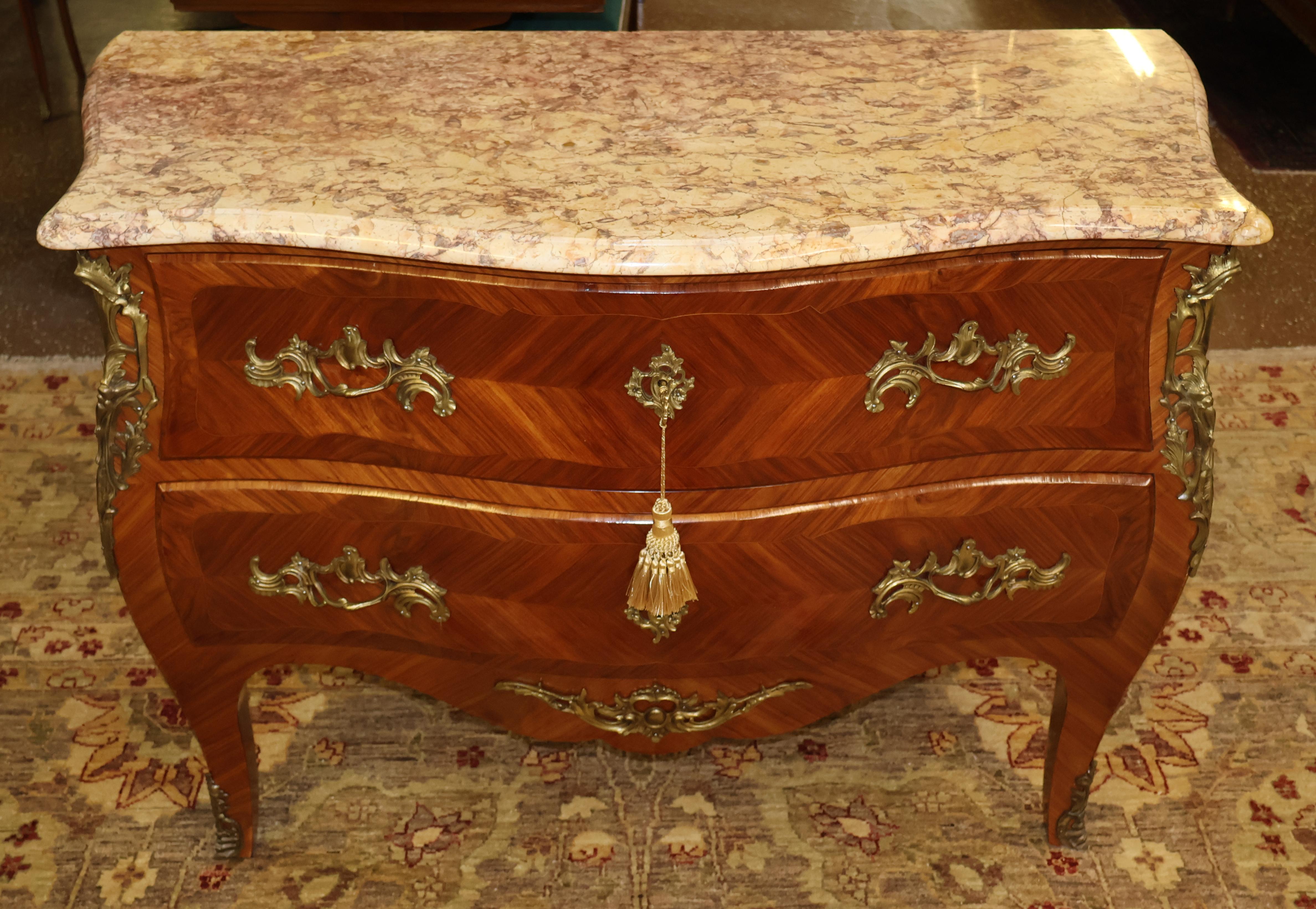 French Louis XV Style Kingwood Marble Top Commode Dresser Chest of Drawers

Dimensions : 45