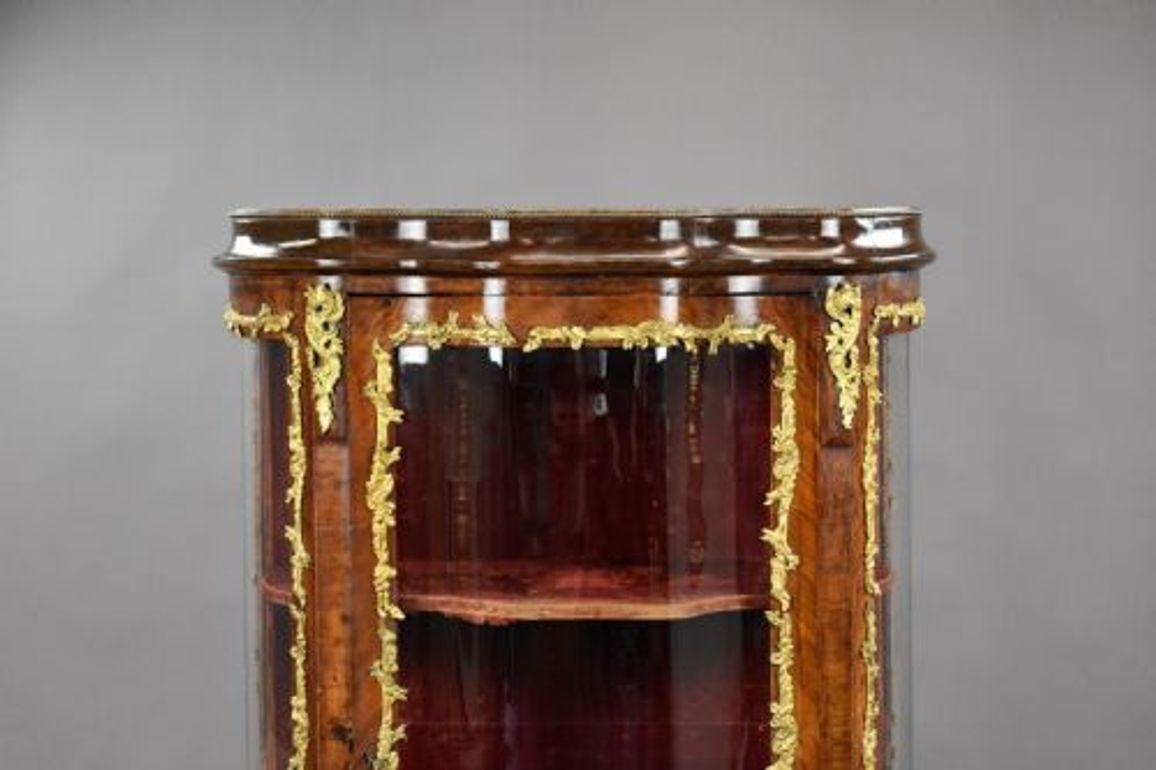 Fine French Louis XV Style Kingwood & Ormolu Mounted Vitrine Cabinet
Item Code: 961
A beautifully crafted French vitrine cabinet in the Louis XV style, showcasing superb workmanship and opulent materials. The shaped glazed front and sides allow for