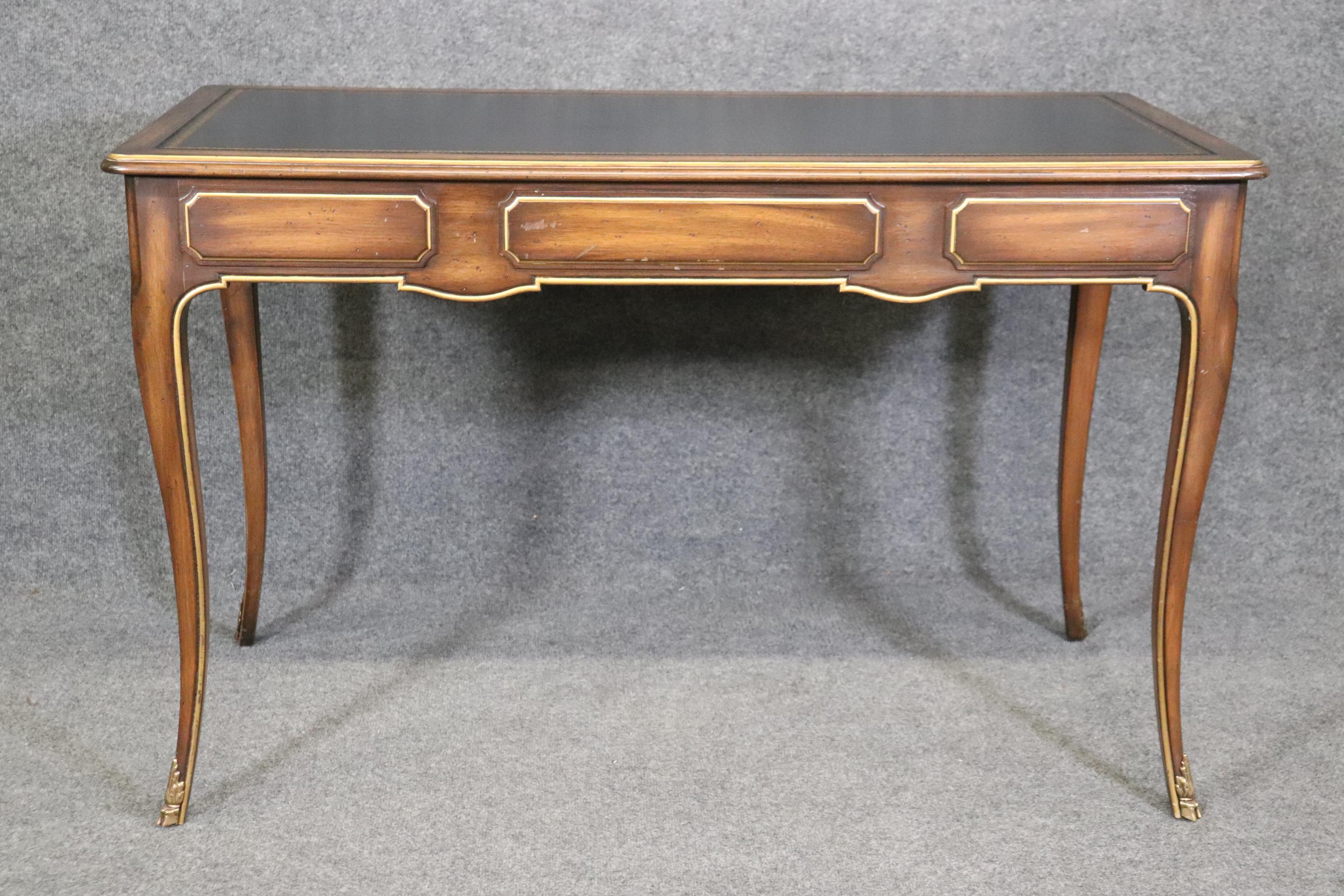 Carved French Louis XV Style Leather Top and Brass Mounted Desk in the Manner of Baker For Sale