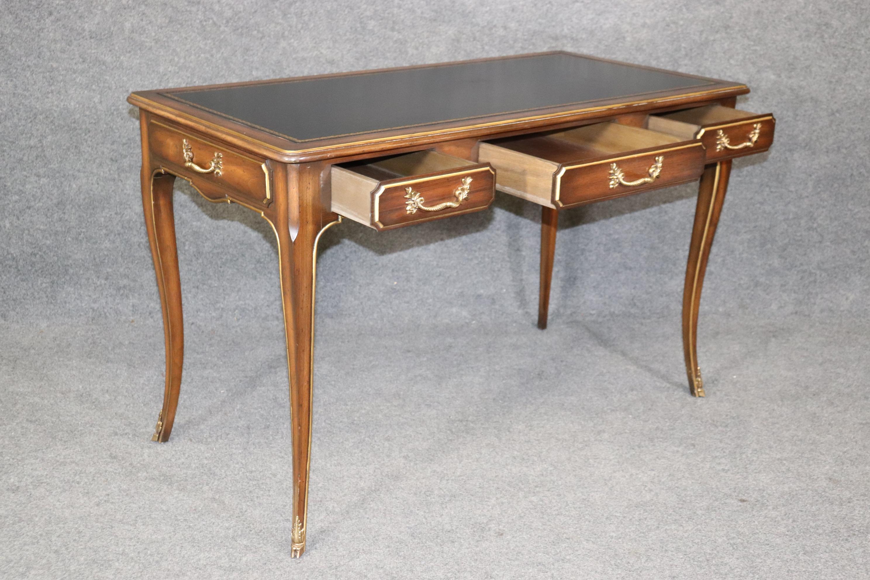 20th Century French Louis XV Style Leather Top and Brass Mounted Desk in the Manner of Baker For Sale