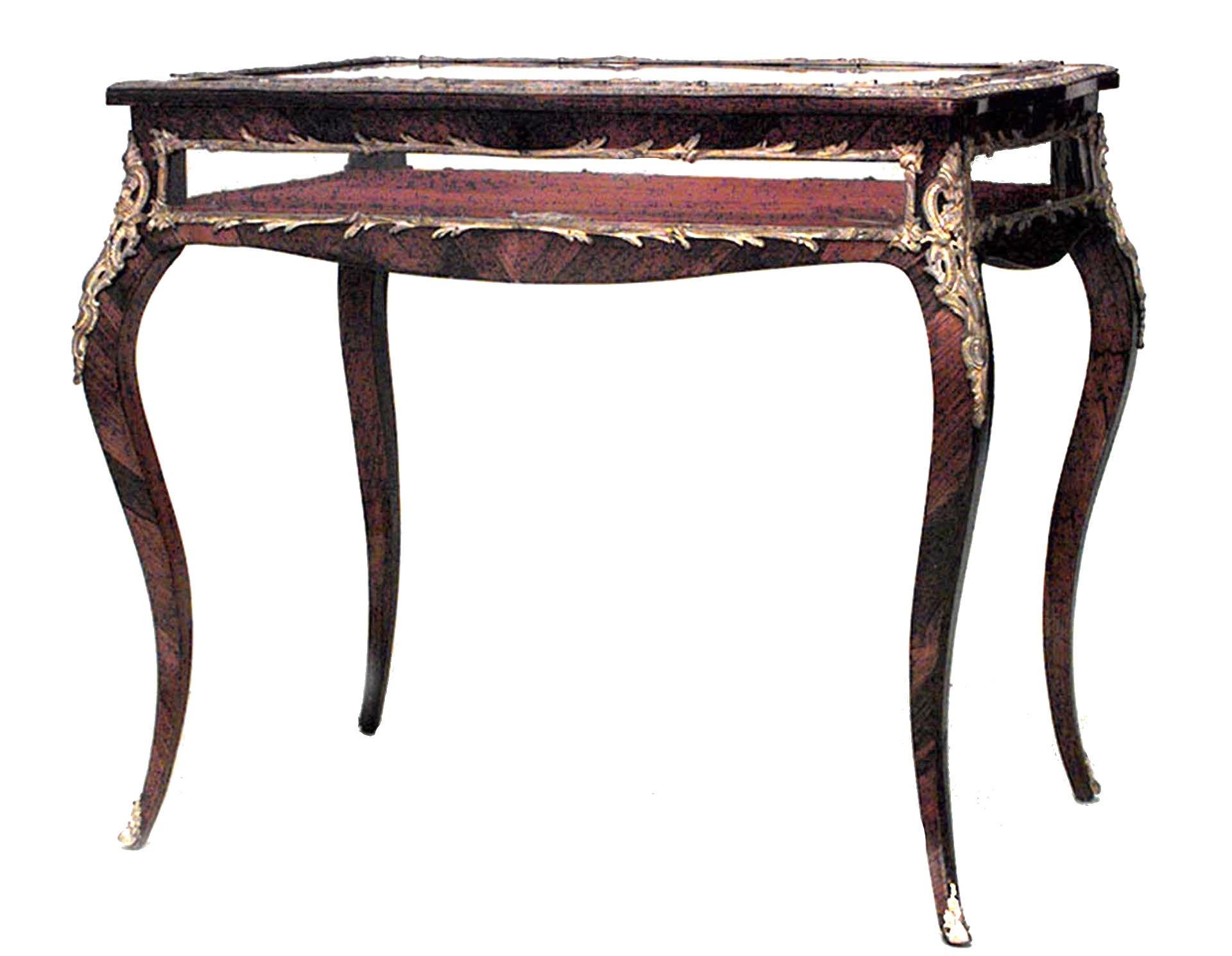 French Louis XV-style (19th Century) mahogany and bronze trimmed vitrine table with glass top and sides.

