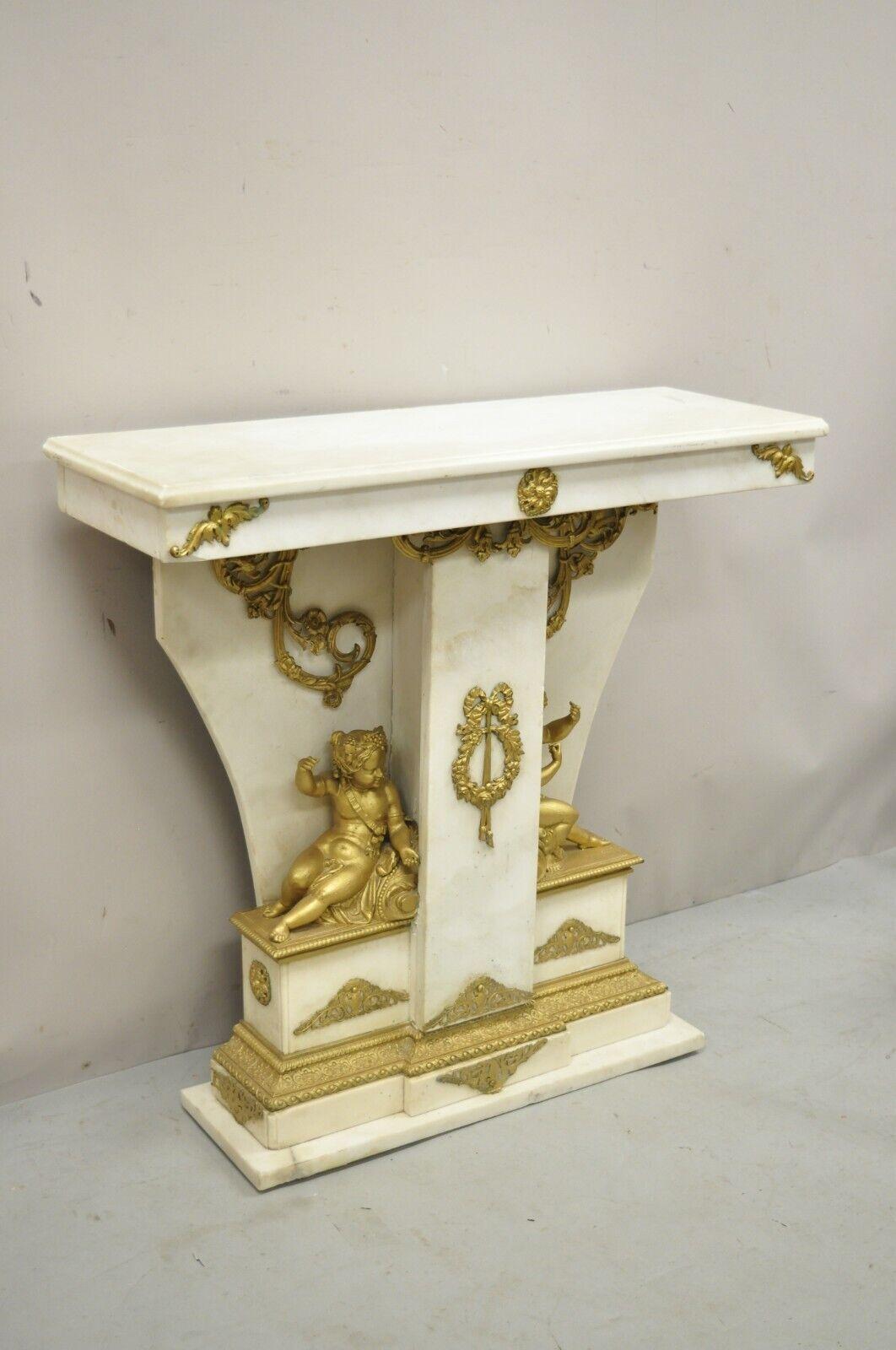 French Louis XV style marble and bronze ormolu console table with Cherubs. Item features 2 full figured cherubs, ornate bronze ormolu throughout, marble construction, very nice antique item, quality French craftsmanship, great style and form. Circa
