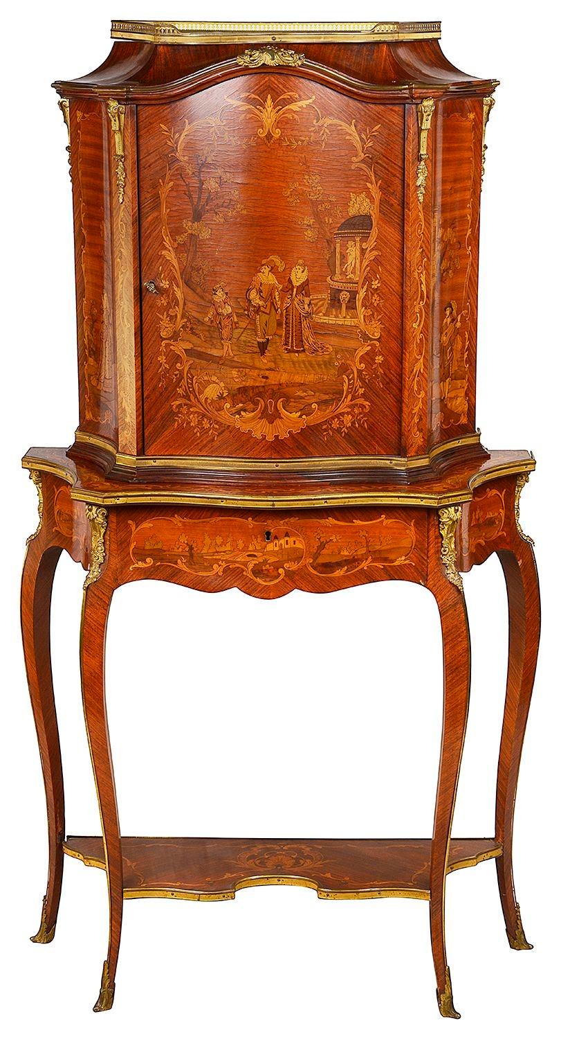 A French Louis XV style serpentine fronted marquetry and ormolu-mounted side cabinet on stand, having wonderful classical romantic scenes inlaid to the sides and front, a single frieze drawer, raised on elegant cabriole legs, terminating in