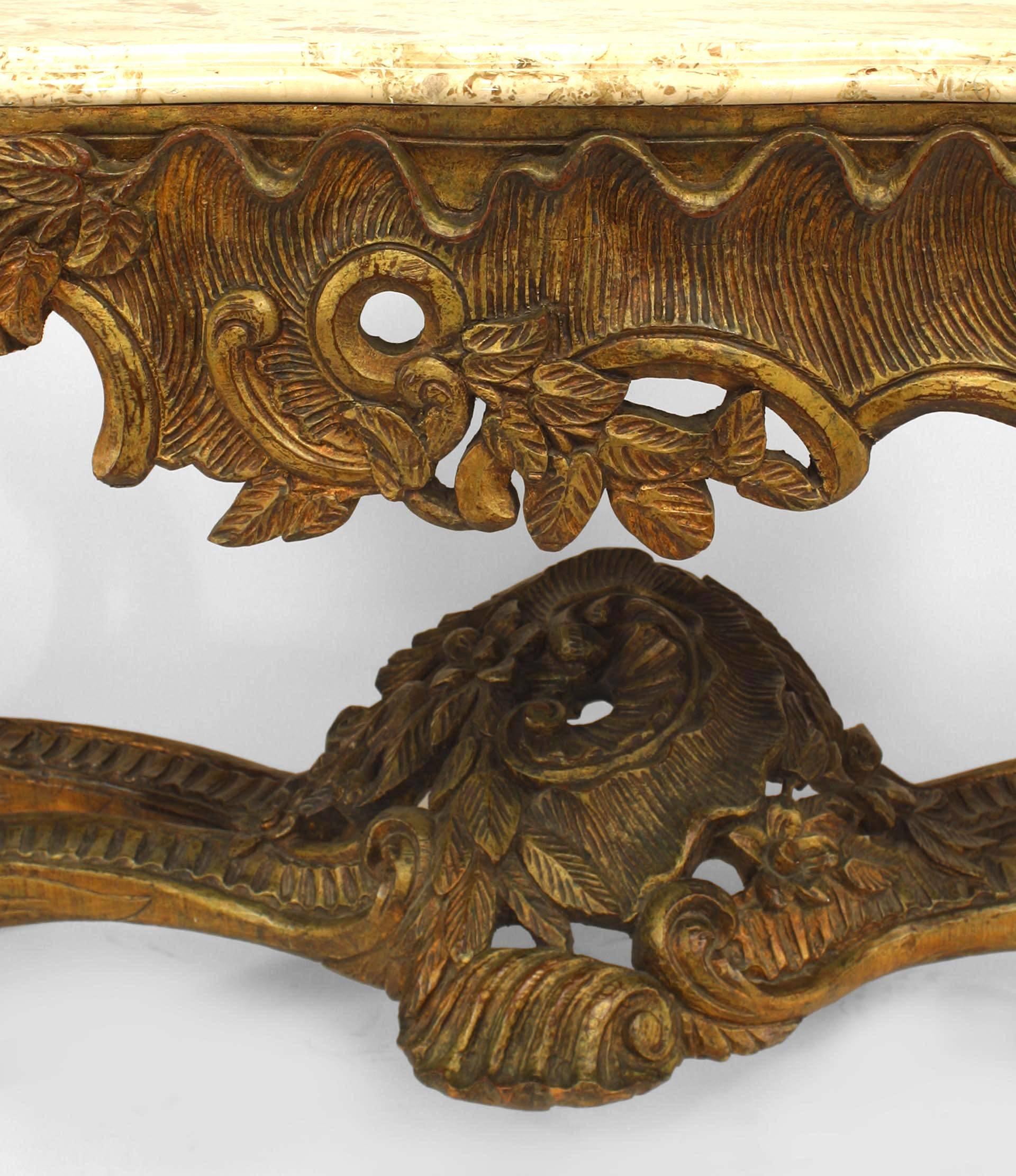 French Louis XV-style (modern) giltwood console on cabriole leg with carved floral stretcher and marble top.
