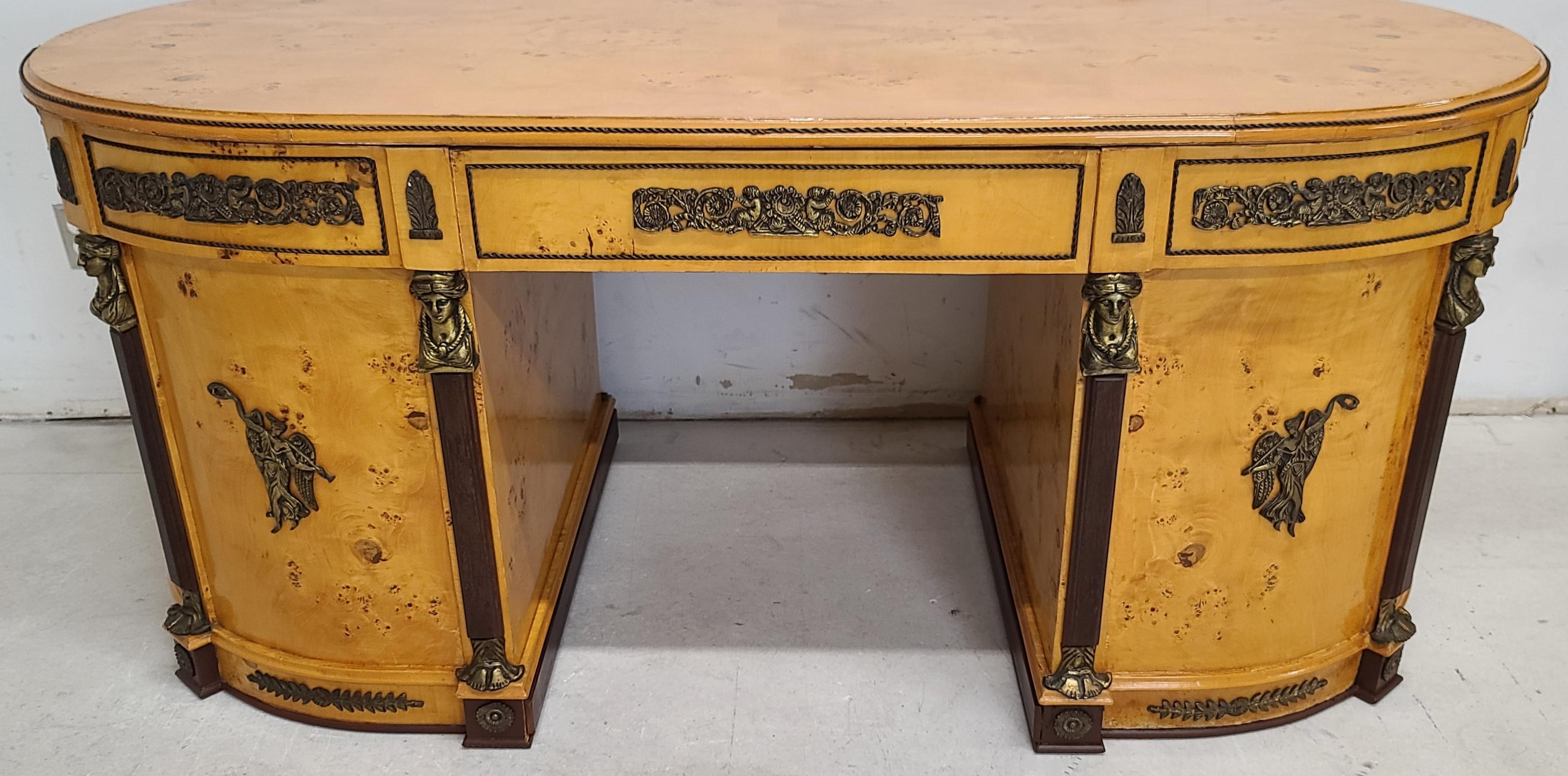 Offering One Of Our Recent Palm Beach Estate Fine Furniture Acquisitions Of A
French Louis XV Style Ormolu Olive Burl wood desk
Featuring 3 drawers and 2 cabinets with key and locks that work on the center and 1 side drawer as well as both cabinet