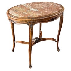Mesa ovalada francesa estilo Luis XV con tapa de mármol