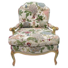 French Louis XV Style Painted Bergere Chair Upholstered In Floral Crewel Linen