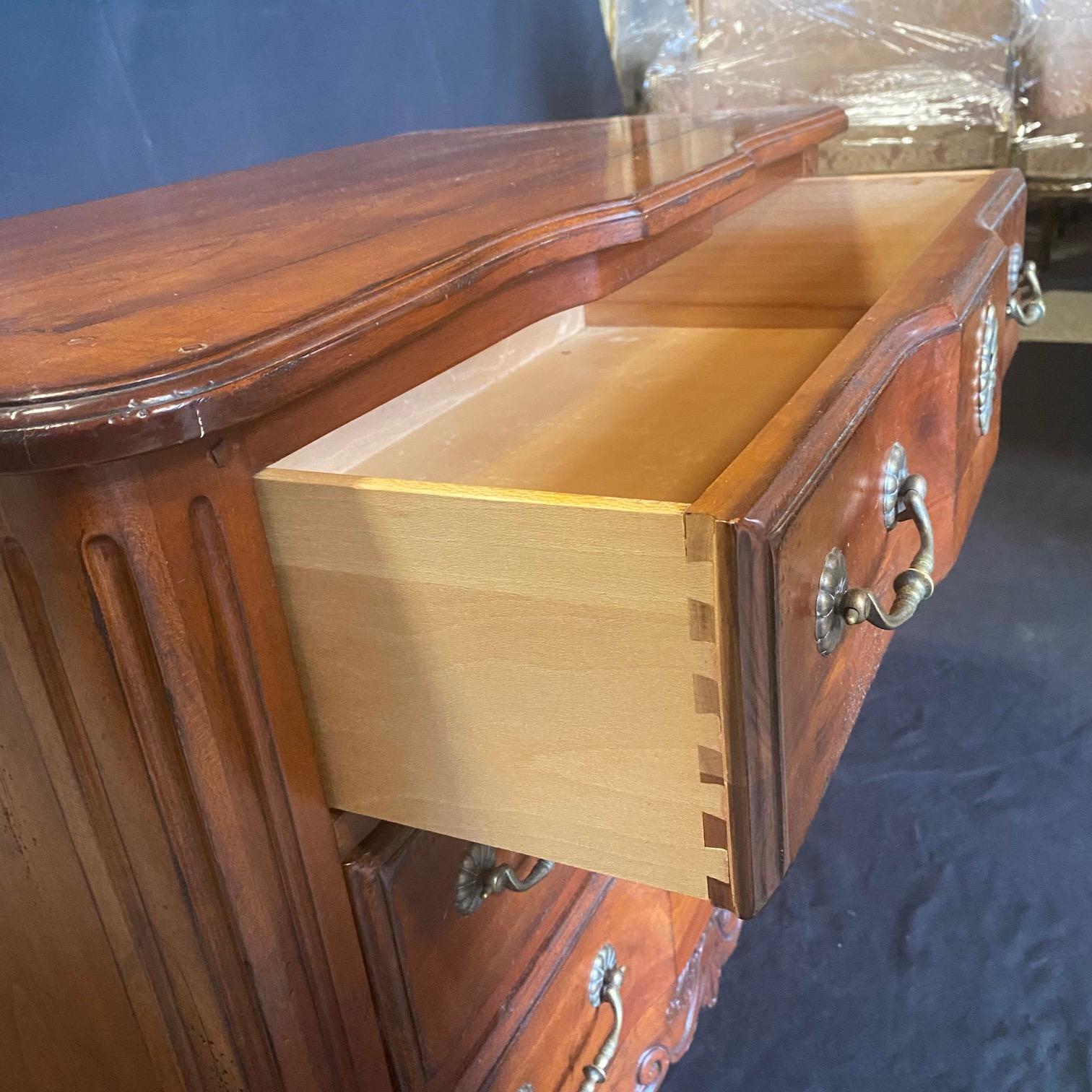 Pair of handsome French Louis XV style commodes and/or night stands with dovetail joints and elegant pulls and escutcheons. Brittany style by Drexel Heritage. Solid, sturdy and elegant!  #6591
Dimensions: H 27” x W 33” x D 18.75”