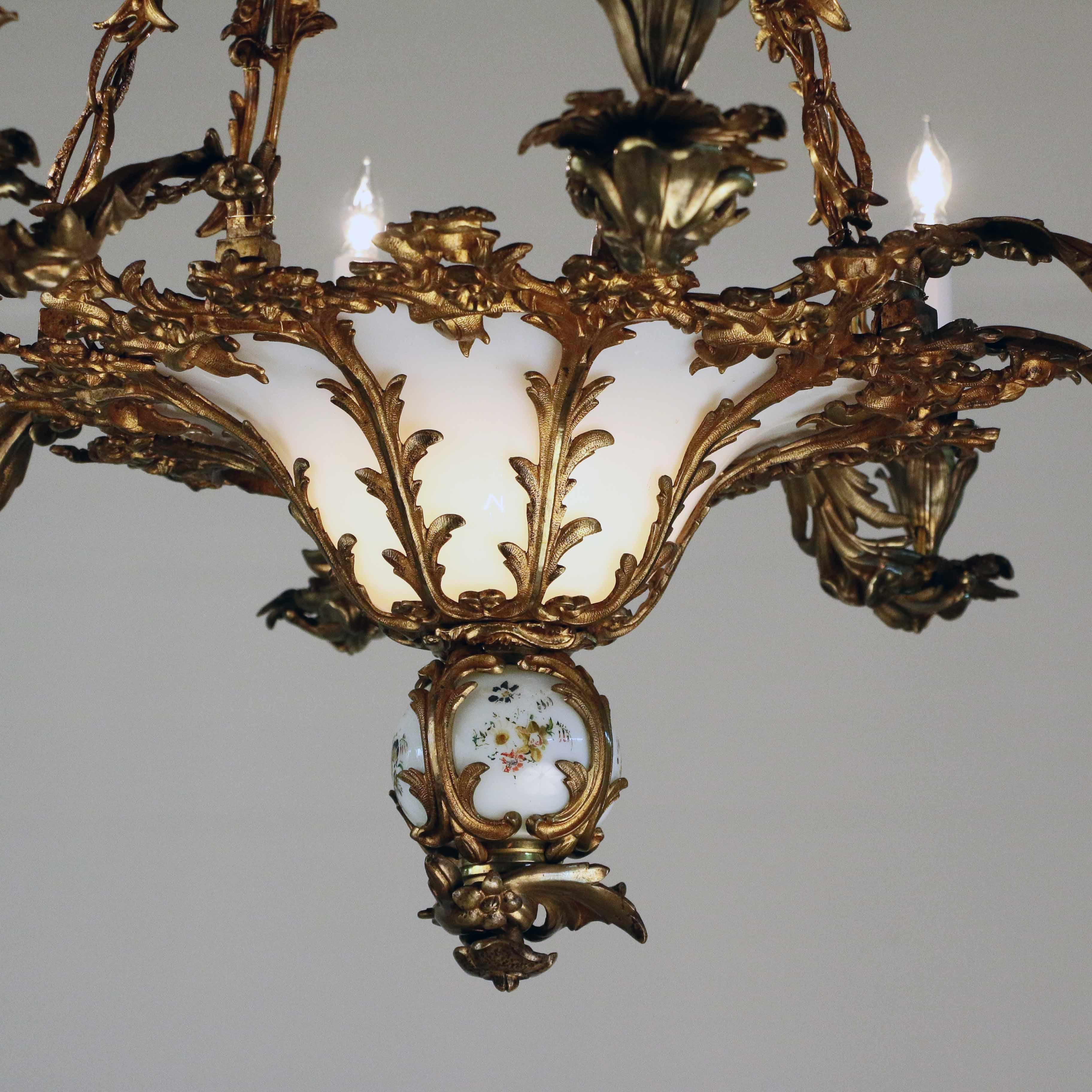 Polished French Louis XV Style Rococo Bronze and Glass Eight-Light Chandelier