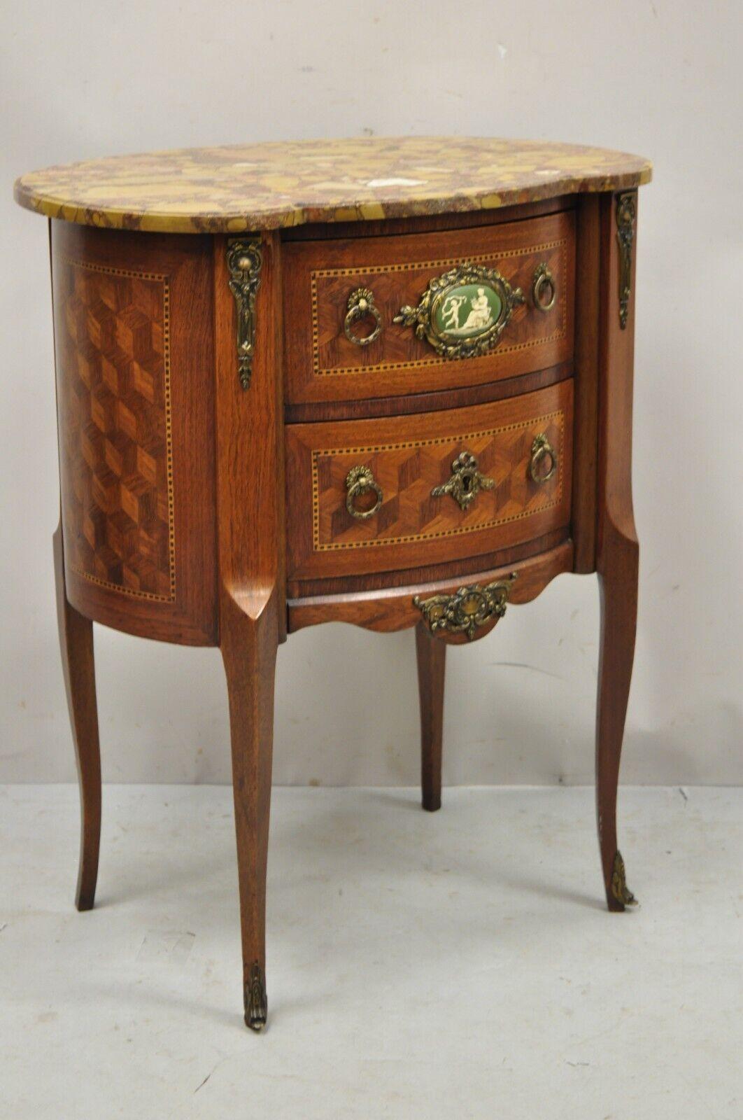 Antique French Louis XV style Rouge marble top bombe commode nightstand side table. Item features rouge marble top, green jasperware medallion to drawer, bronze ormolu, satinwood marquetery inlay. Circa early 1900s. Measurements: 29