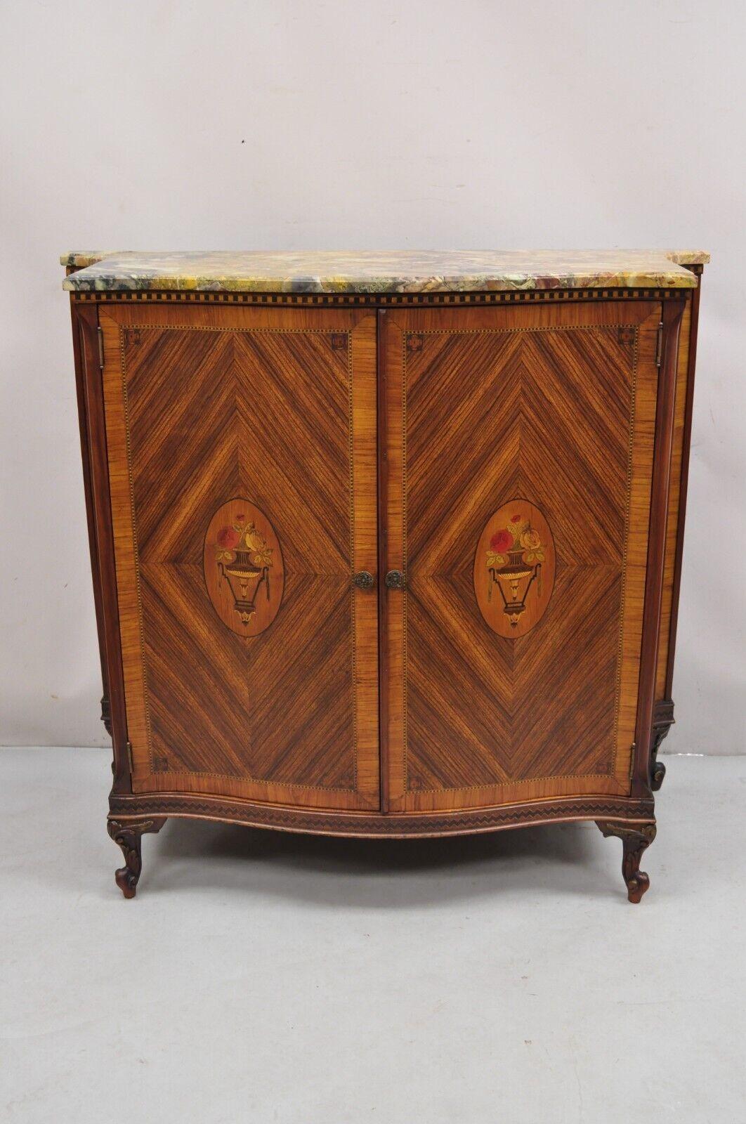 Antique French Louis XV Style Rouge Marble Top Demilune Dresser Cabinet with 5 Drawers. Item features sunburst inlay throughout, floral bouquet inlay to door fronts, concave sides, 2 swing doors which conceal 5 dovetail constructed drawers, very