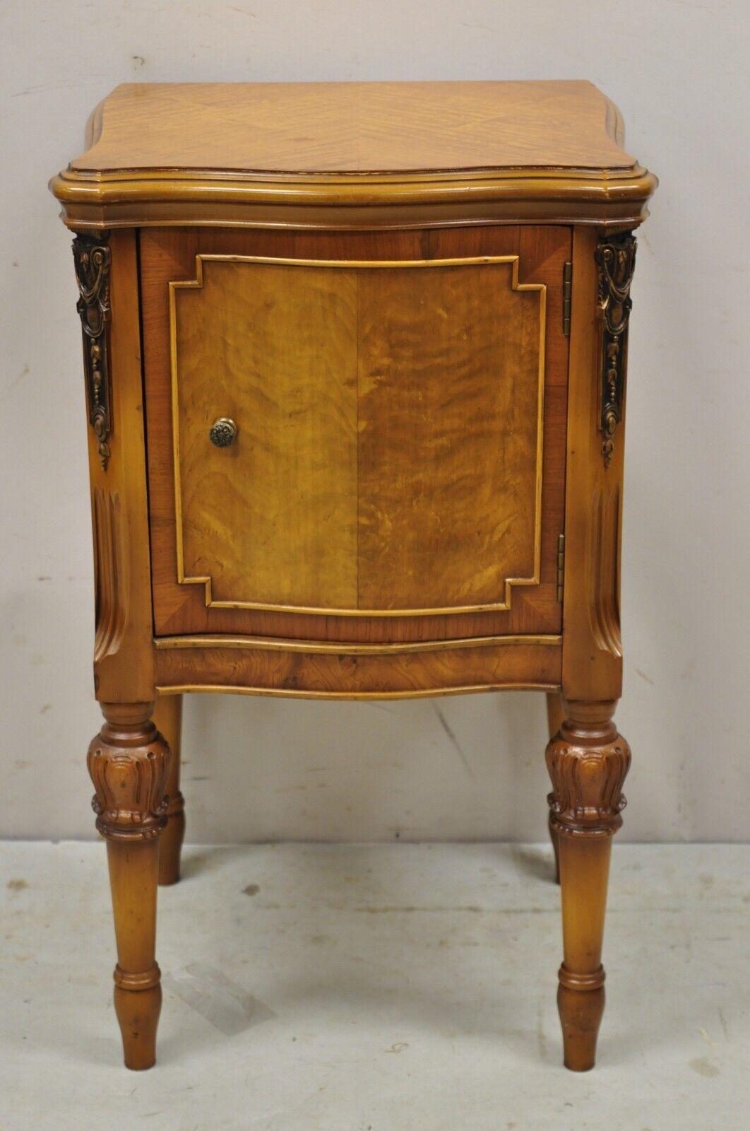 Antique French Louis XV Style satinwood one door nightstand bedside cabinet by Joerns. Item features beautiful wood grain, 1 swing door, tapered legs, very nice antique item, quality American craftsmanship, great style and form, circa Early to