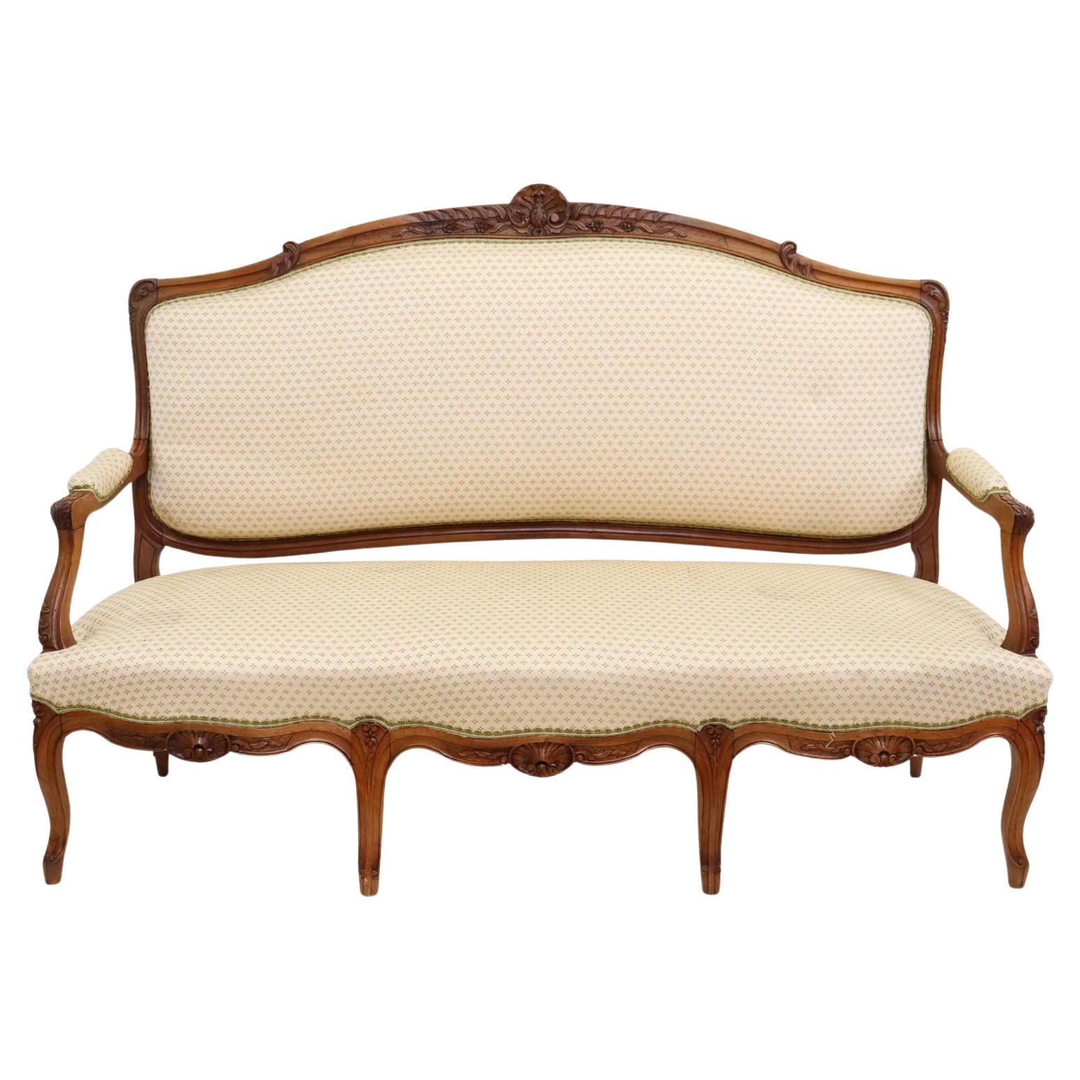 Settee française tapissée de style Louis XV