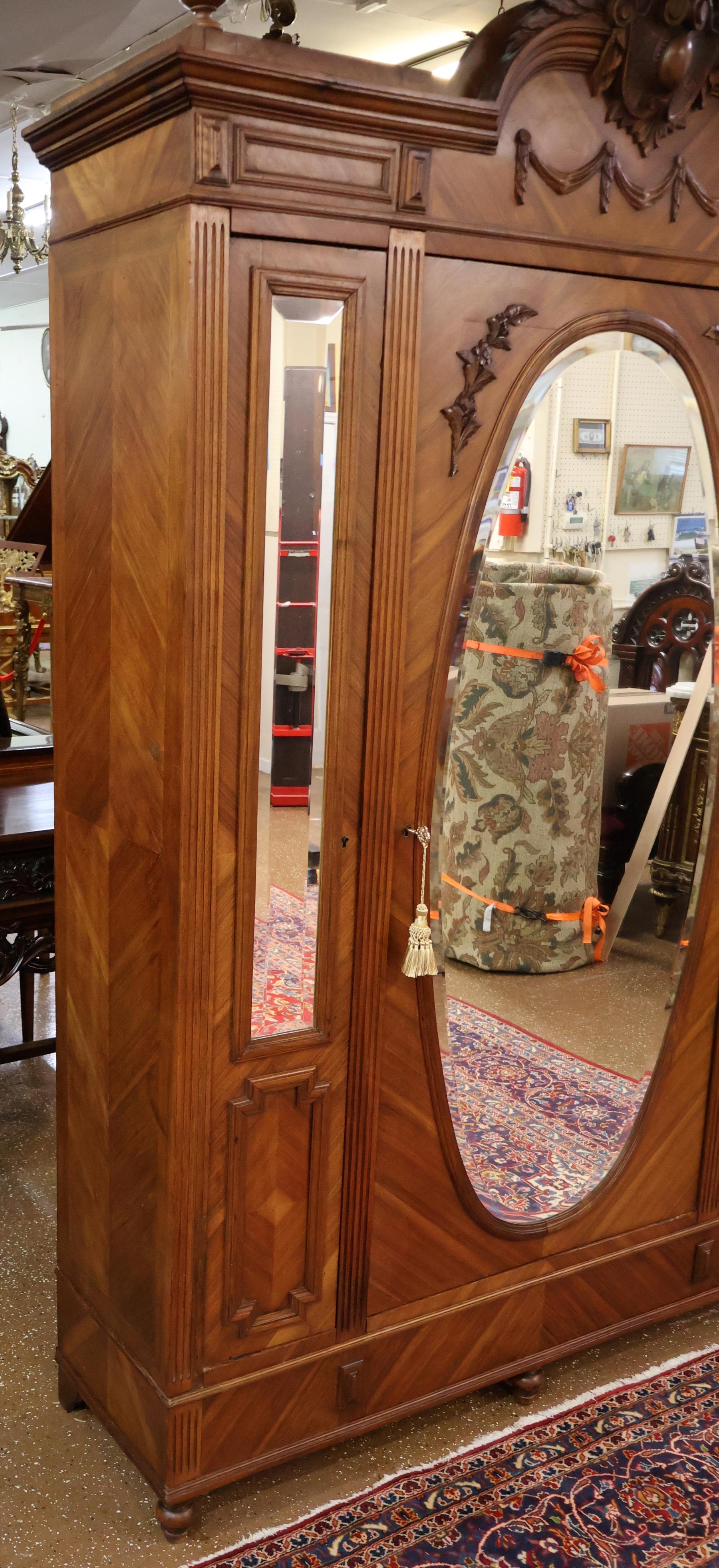 Inizio XX secolo French Louis XV Style Walnut Carved Mirror Door Armoire Circa 1900 in vendita