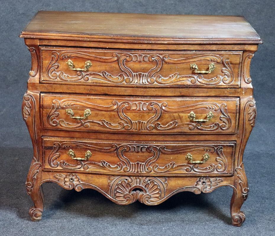 French Louis XV style 3-drawer distressed finish 3-drawer walnut commode.