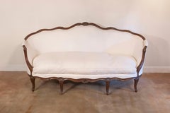 French Louis XV Style Walnut Upholstered Canapé with Wraparound Back, circa 1850
