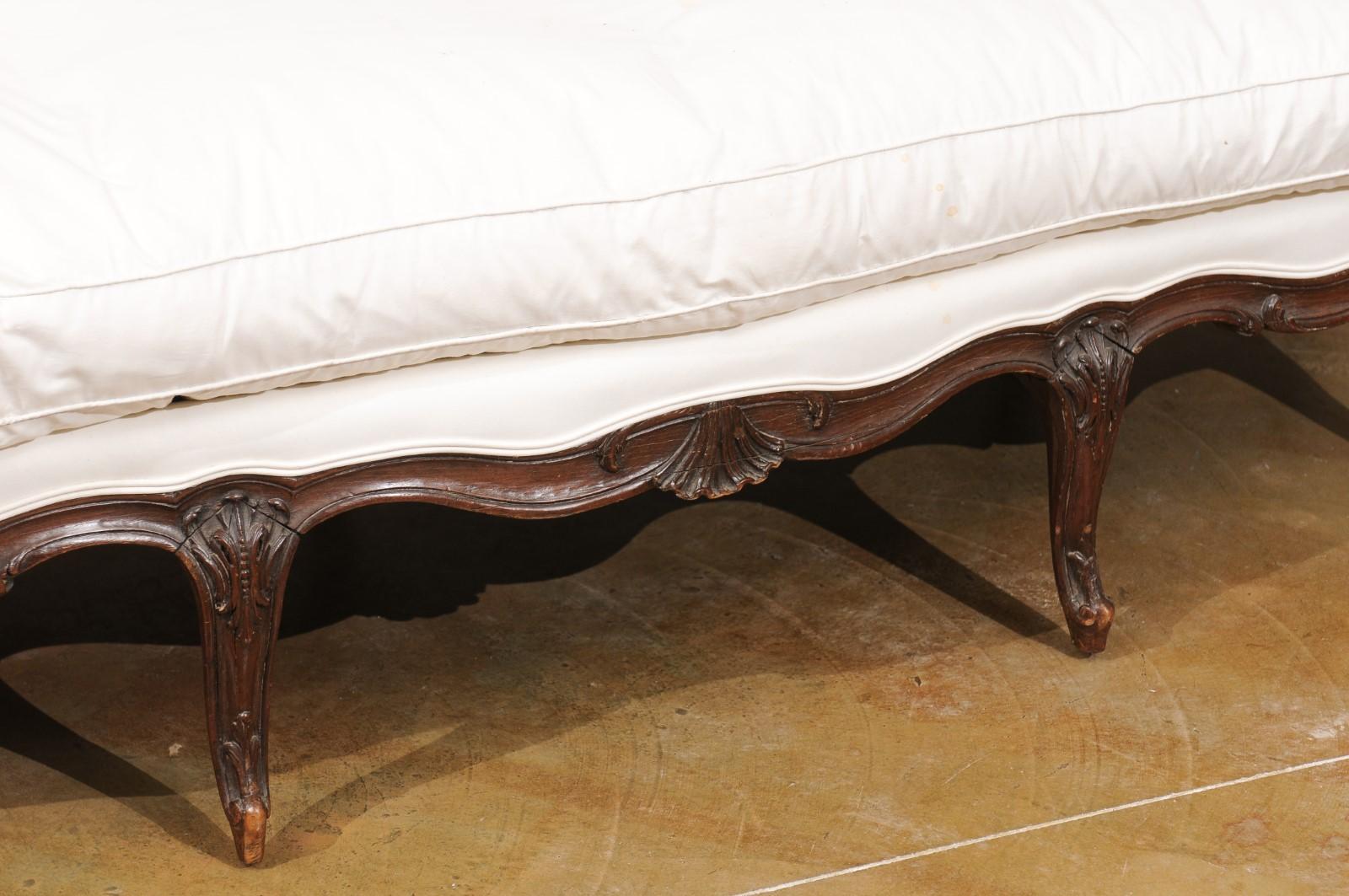 19th Century French Louis XV Style Walnut Upholstered Canapé with Wraparound Back, circa 1850 For Sale