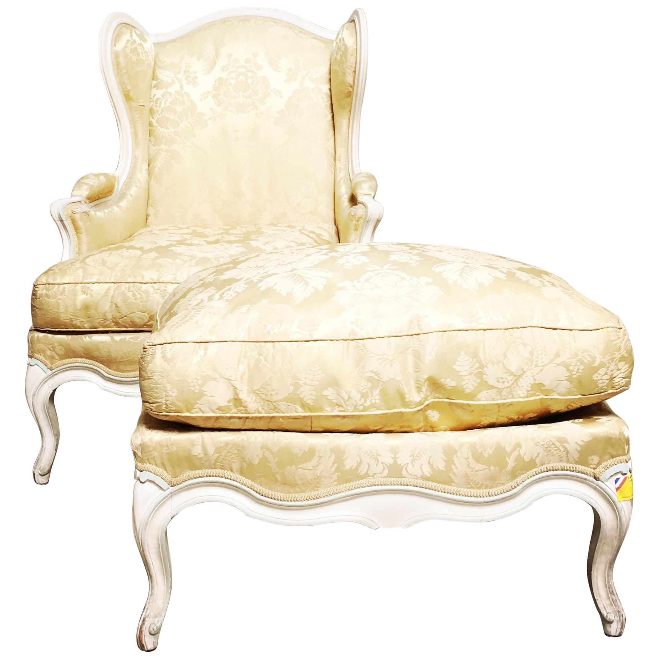 French Louis XV Style Winged Bergere and Matching Ottoman For Sale