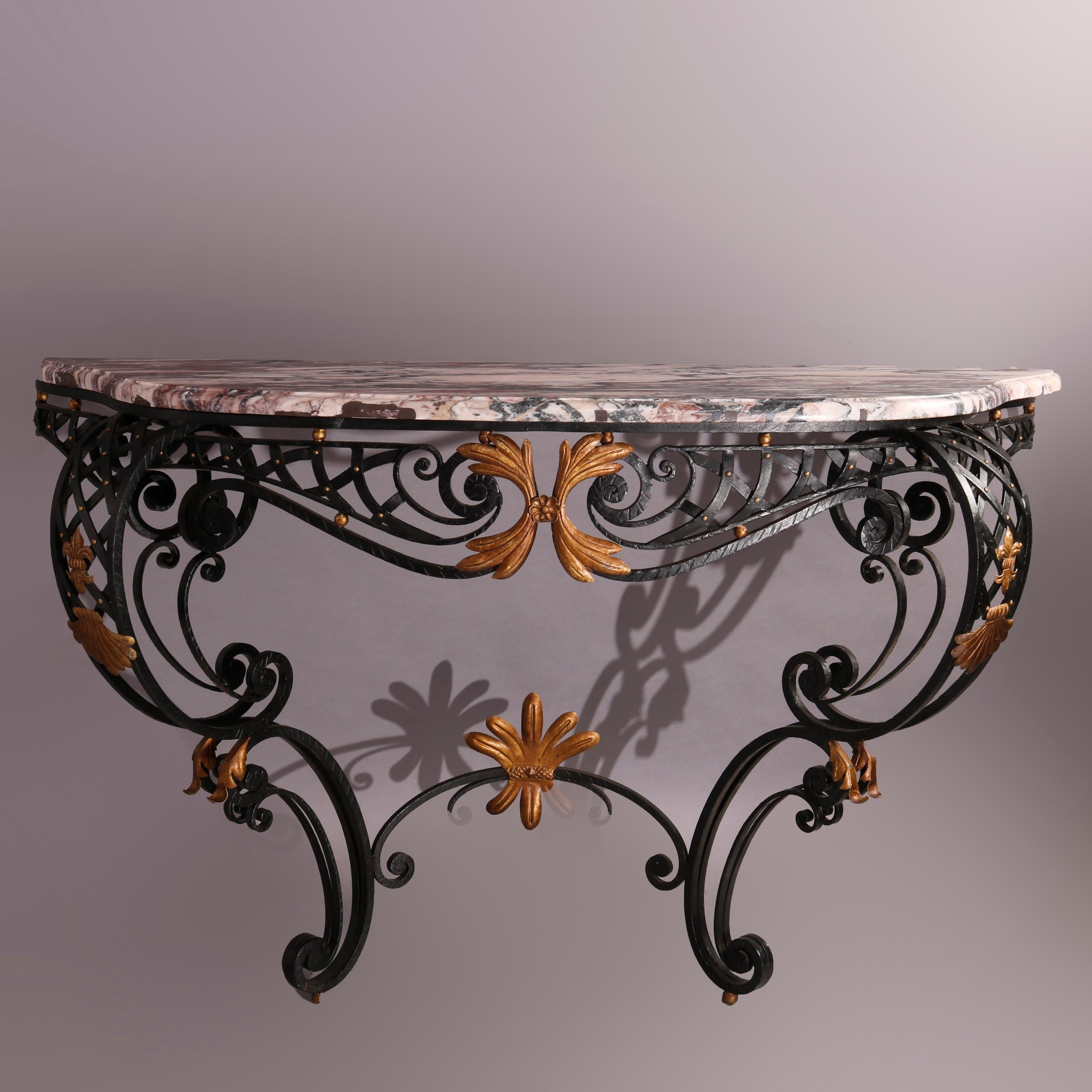 A French Louis XV style console table offers shaped and beveled marble top over basket weave wrought iron base having cabriole scroll form legs and gilt foliate elements, 20th century

Measures - 42''H x 63''W x 25''D.
 
Catalogue Note: Ask about
