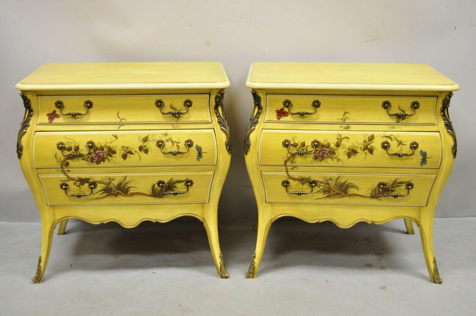French Louis XV Style Yellow Butterfly Painted 3 Drawer Bombe Nightstands - a Pair. Item features yellow painted finish, hand painted butterfly and floral vine scenes to the front and sides, brass ormolu, shapely bombe form, 3 drawers, solid brass