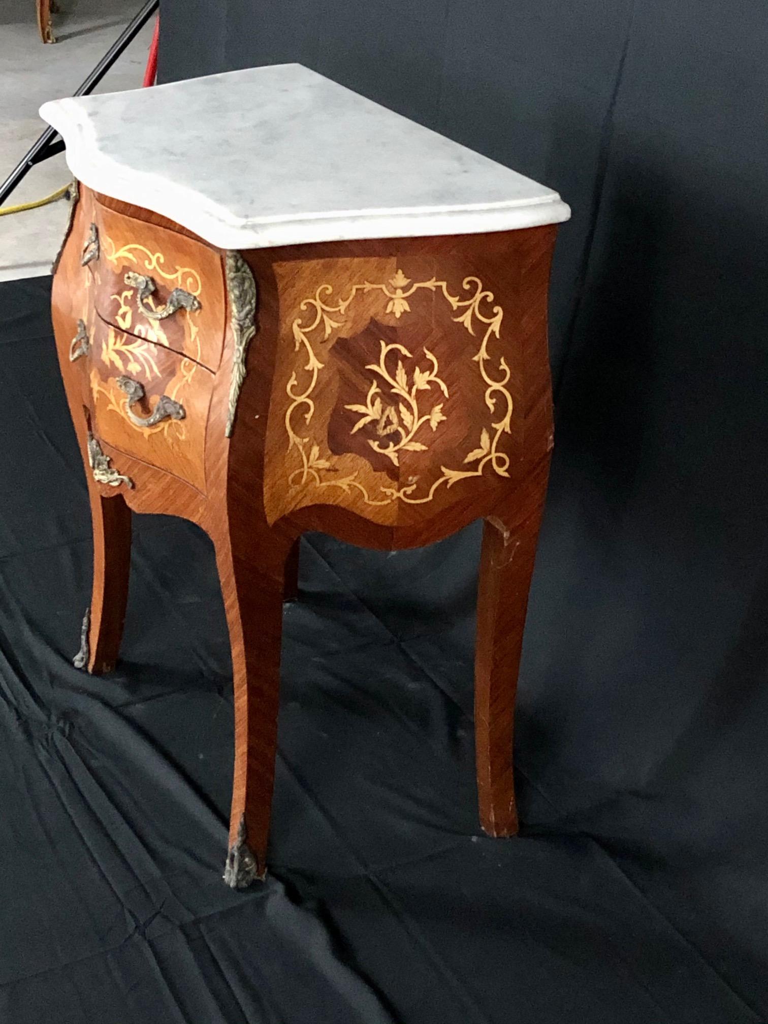 French Louis XV nightstand, side or end table with stunning marquetry and two drawers, topped with a beautiful Italian Carrara marble carved and beveled top.
 #4617.