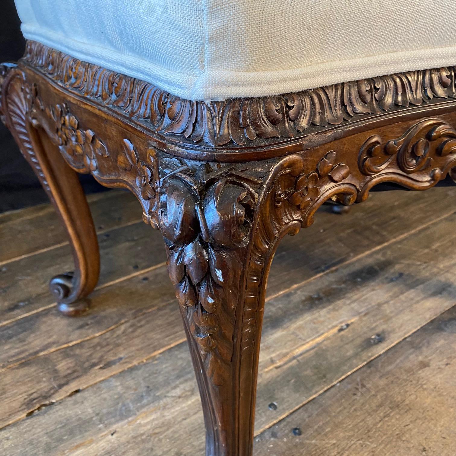 French Louis XV Walnut Bench or Ottoman with Exquisite Carving For Sale 1